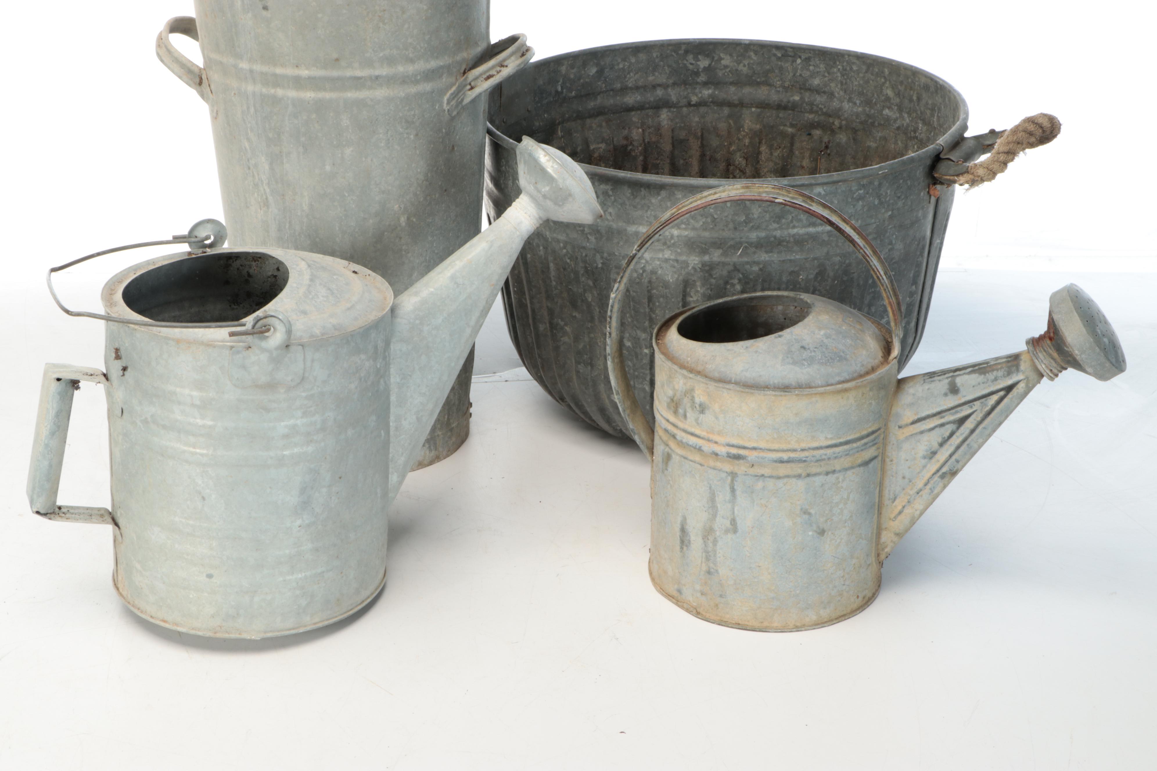 Metal Watering Cans, Wooden "Flowers" Sign, and More Outdoor Décor