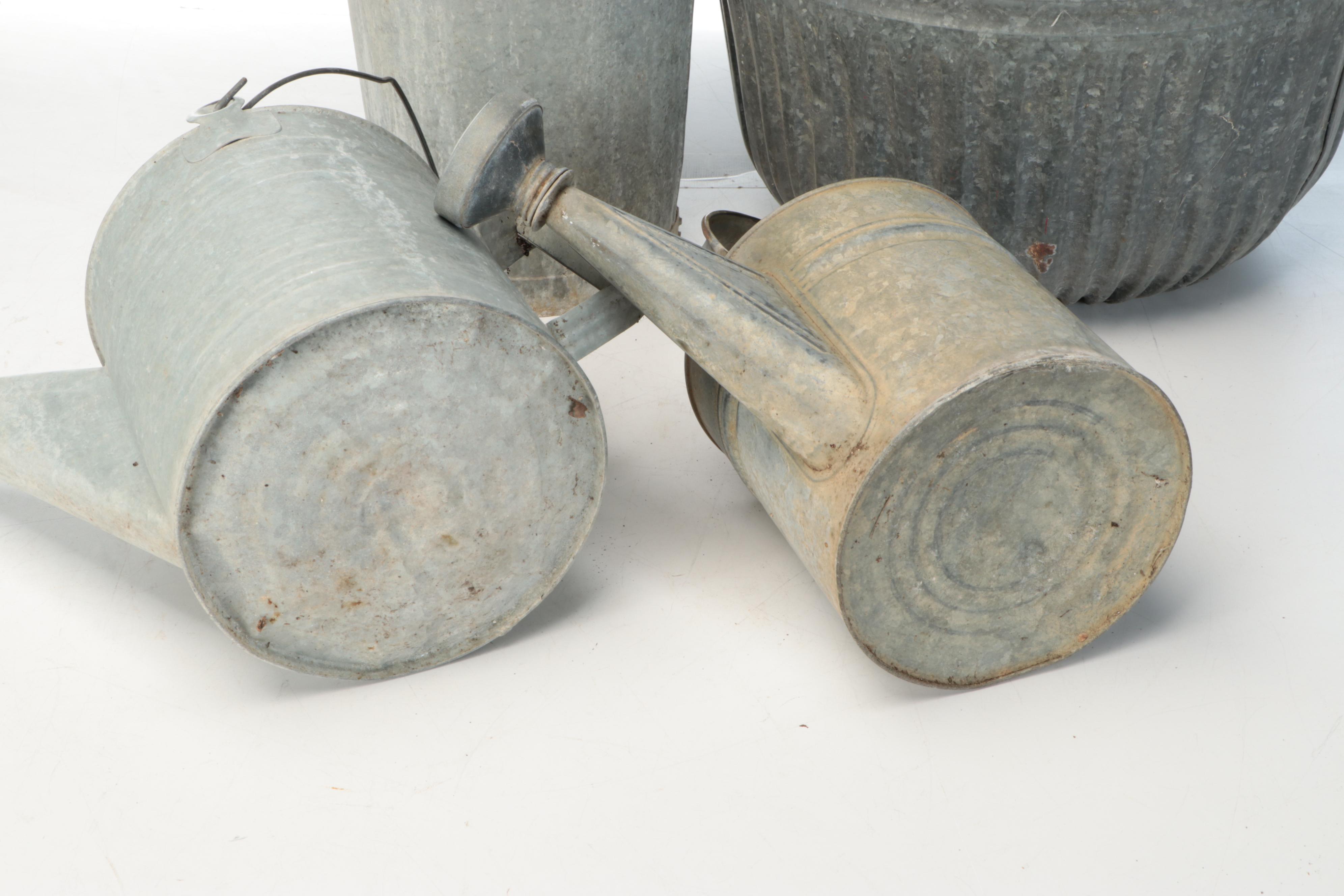 Metal Watering Cans, Wooden "Flowers" Sign, and More Outdoor Décor