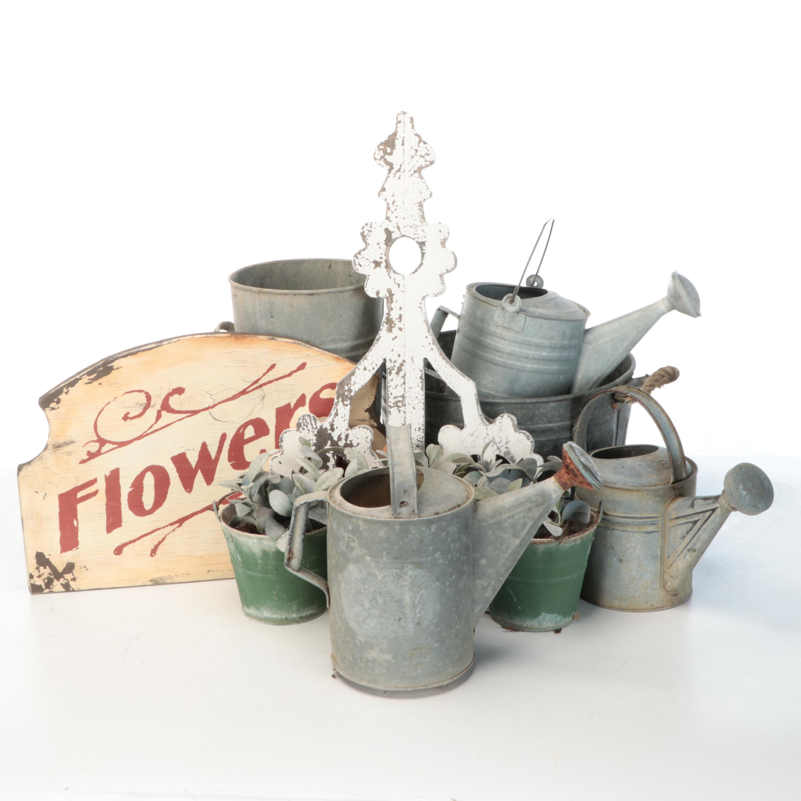 Metal Watering Cans, Wooden "Flowers" Sign, and More Outdoor Décor