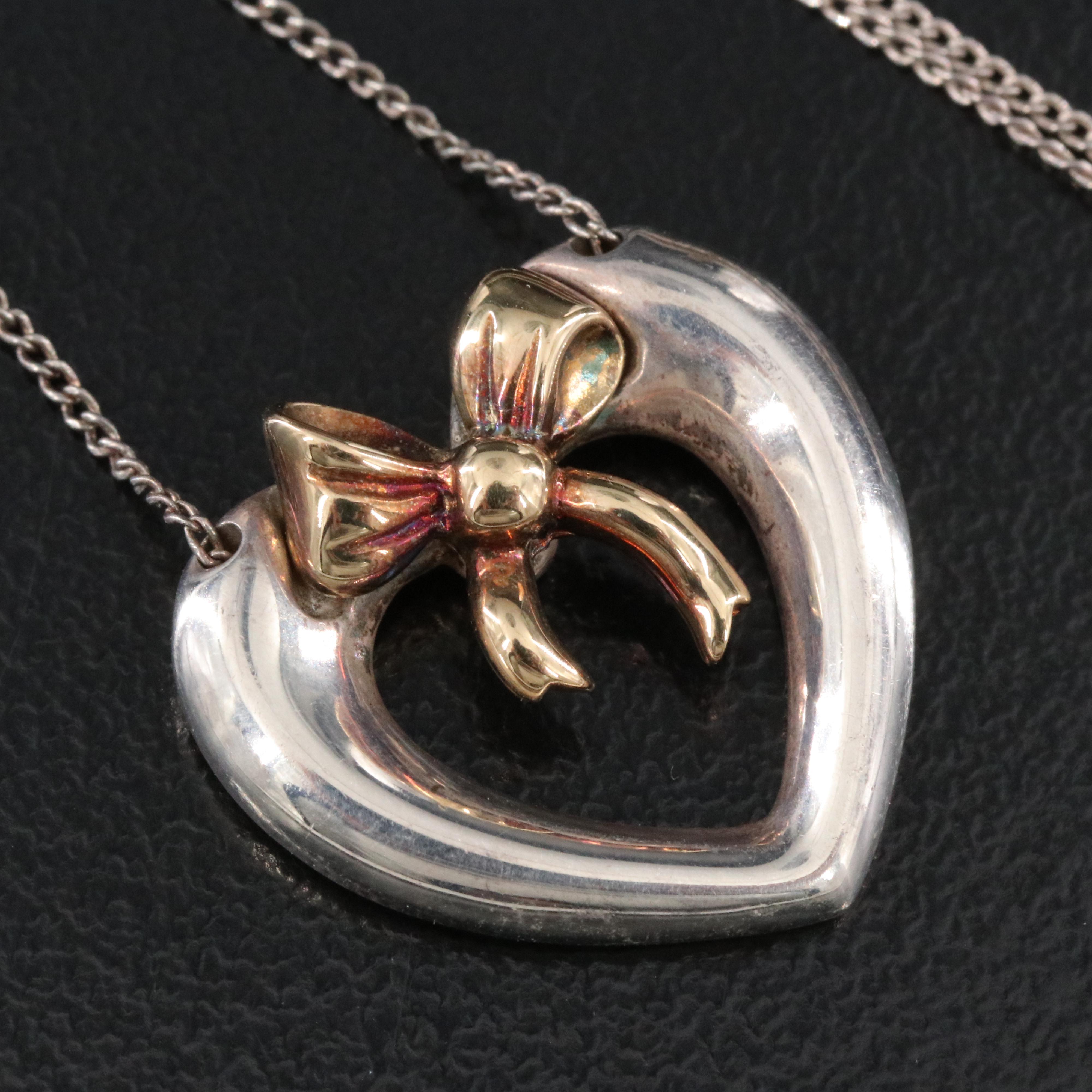 Tiffany & Co. 18K Gold Bow and Sterling Open Heart Necklace