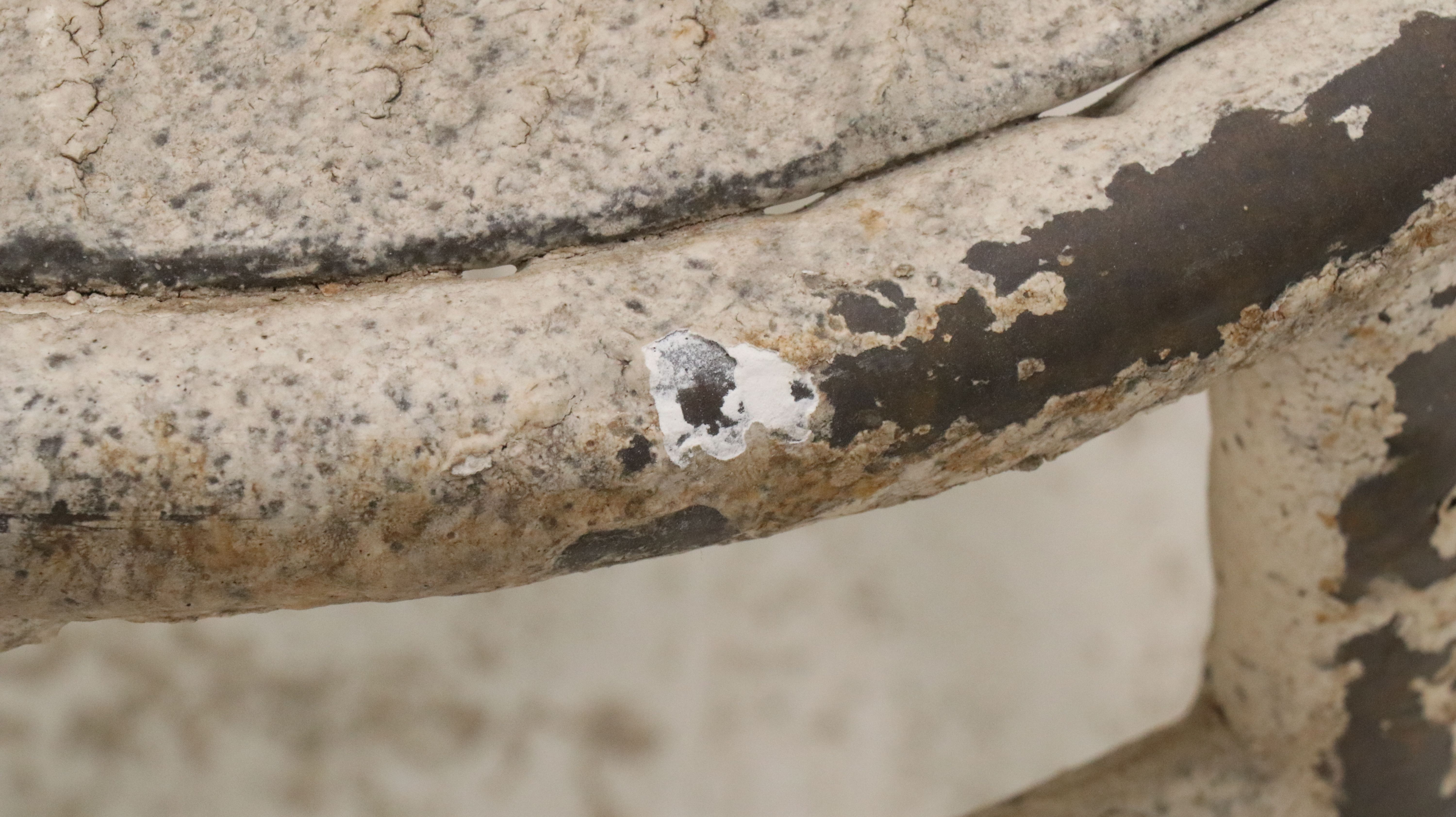 Set of Four Painted White Cast Metal Chairs