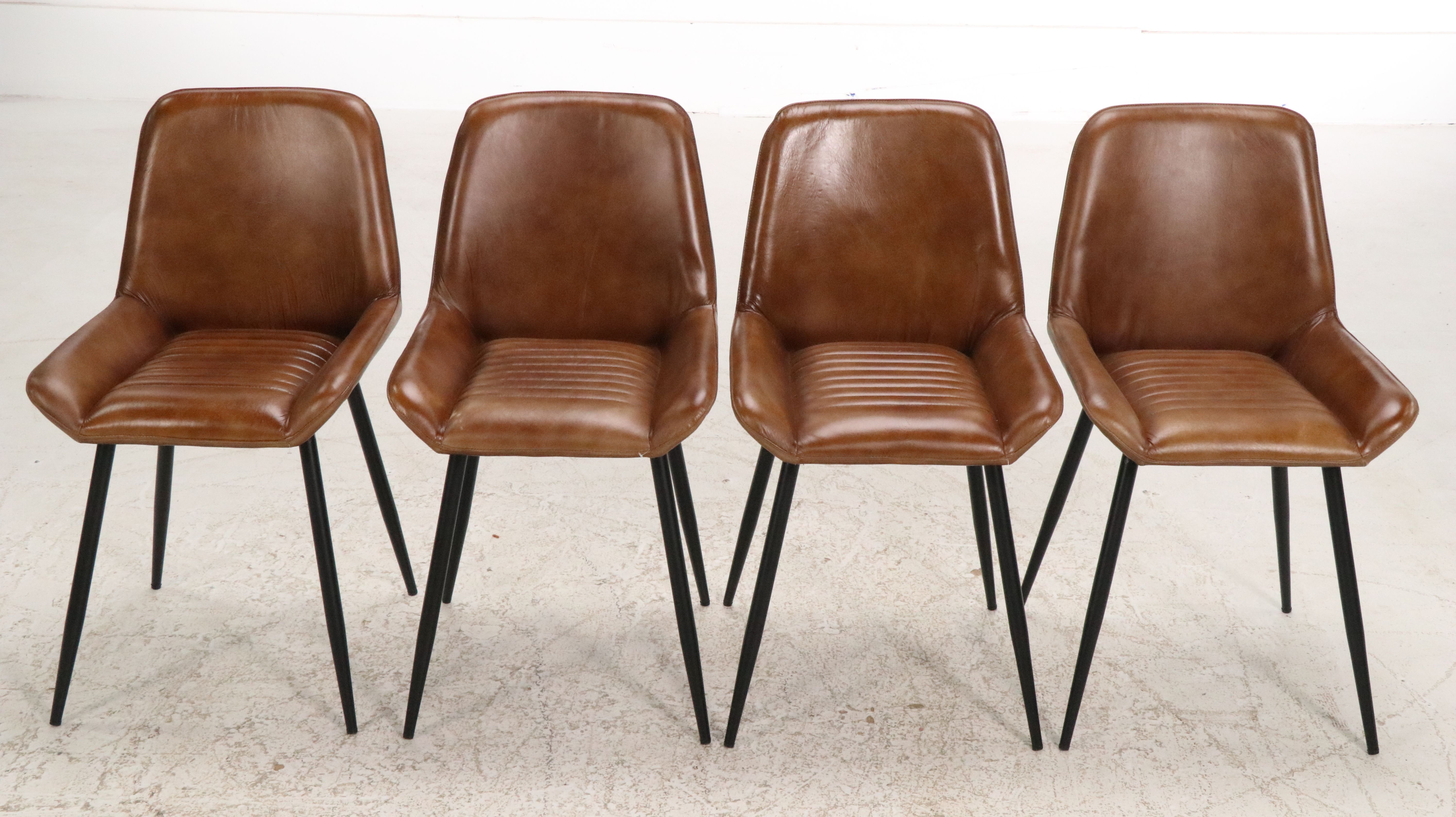 Four Modernist Faux Leather Upholstered Dining Chairs