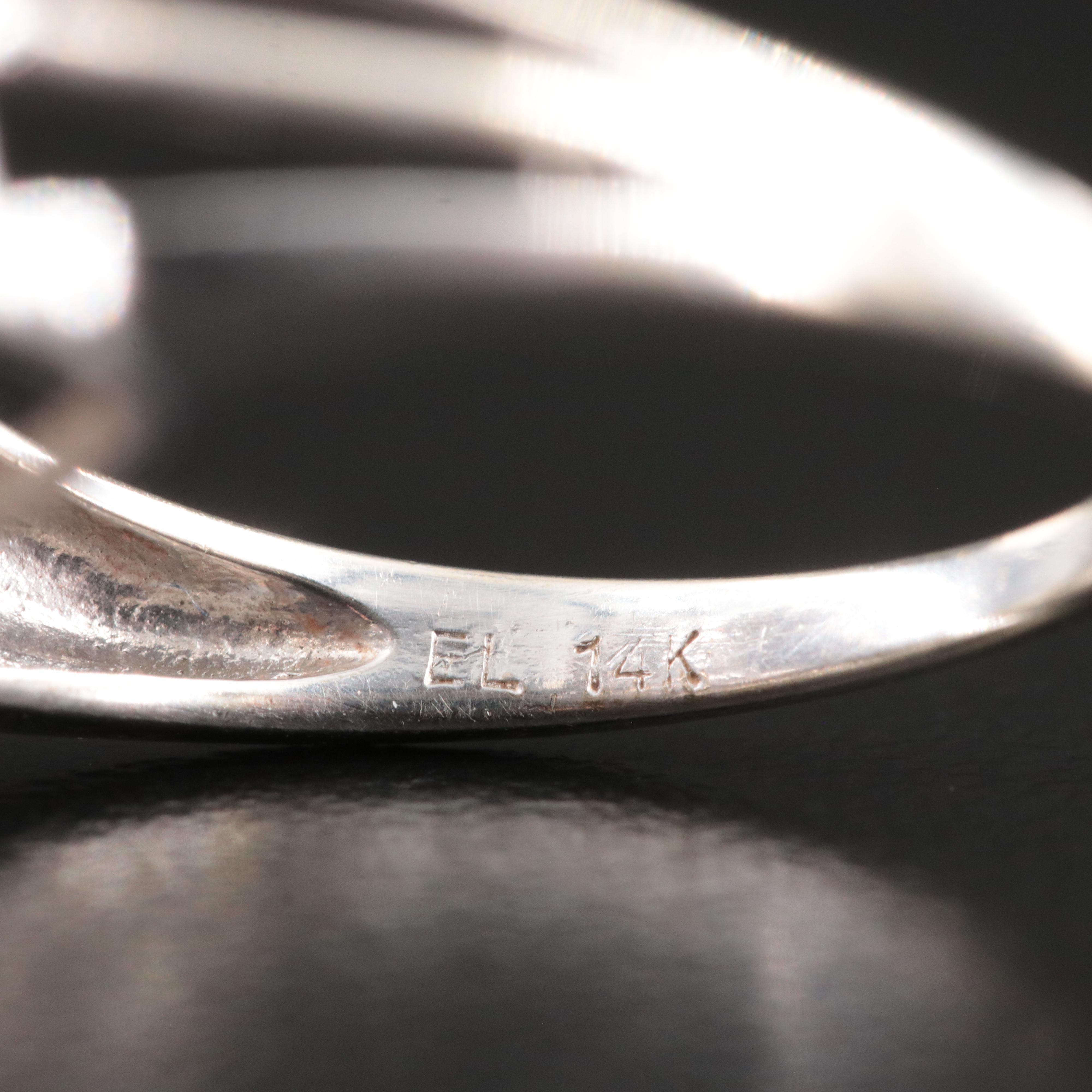 14K1.32 CTW Diamond Flower Ring