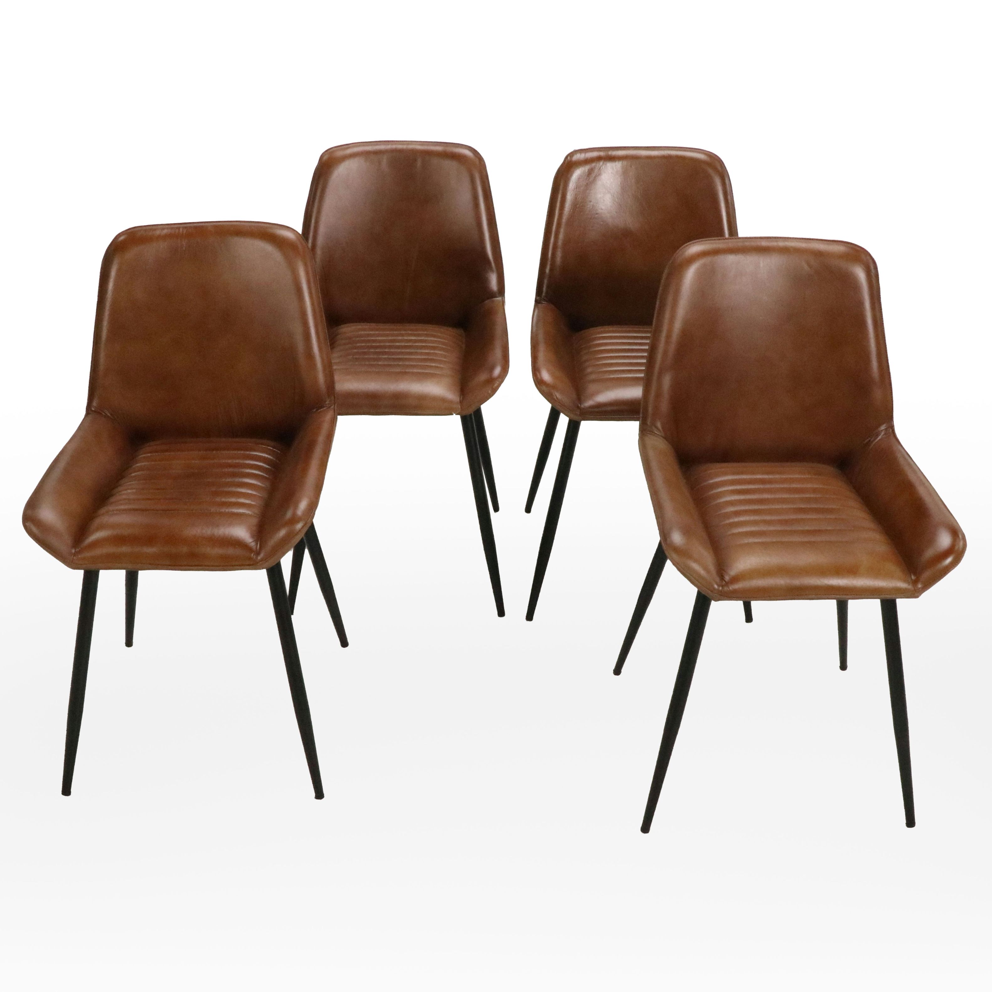 Four Modernist Faux Leather Upholstered Dining Chairs