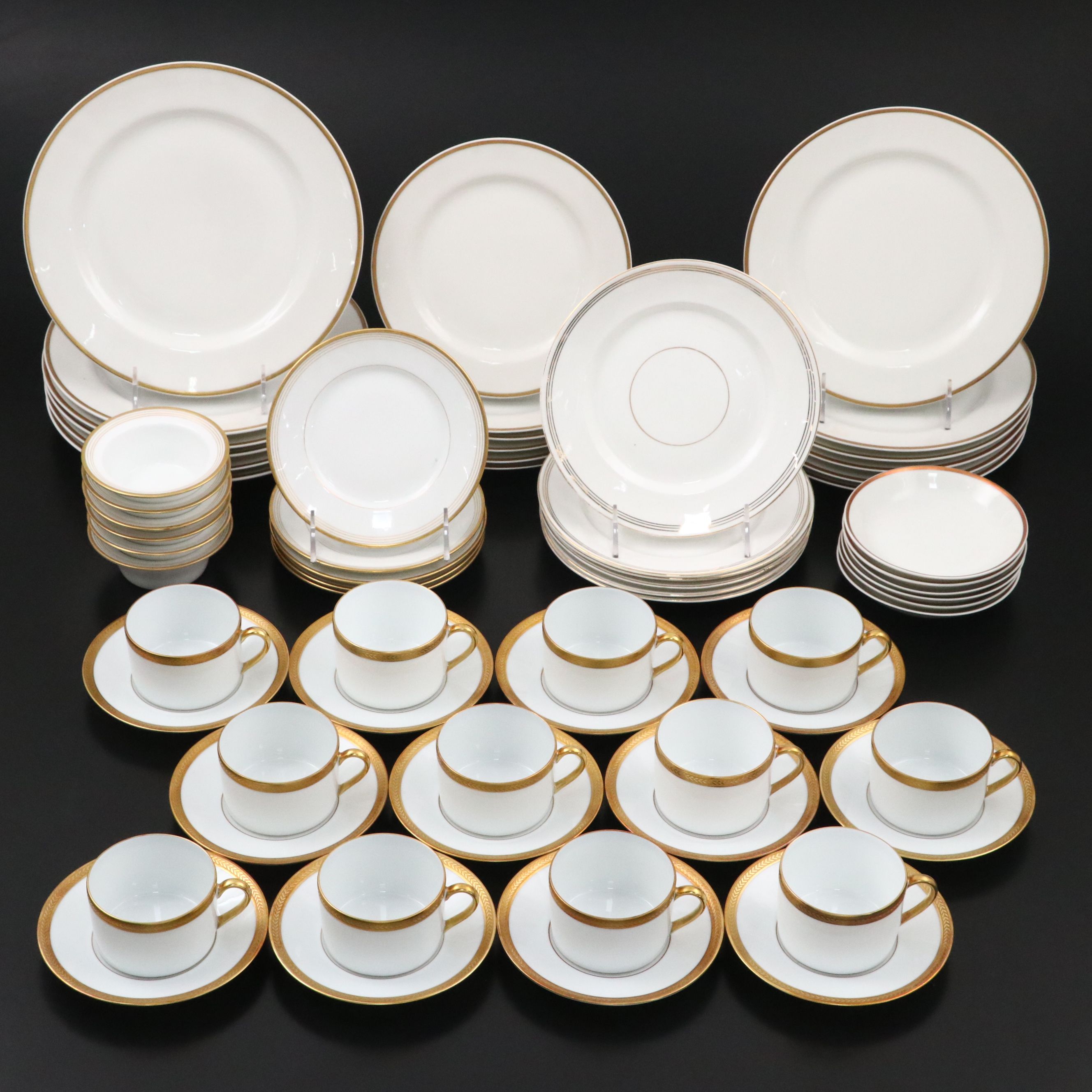 Bernardaud "Vienne" Cups and Saucers and Other Gilt Porcelain Dinnerware