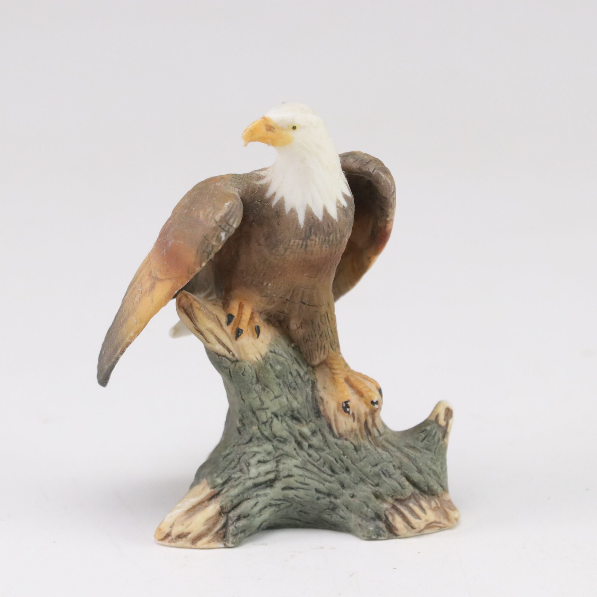 Carved Resin & Porcelain Eagles with American Flag and Western Saddle Figurines