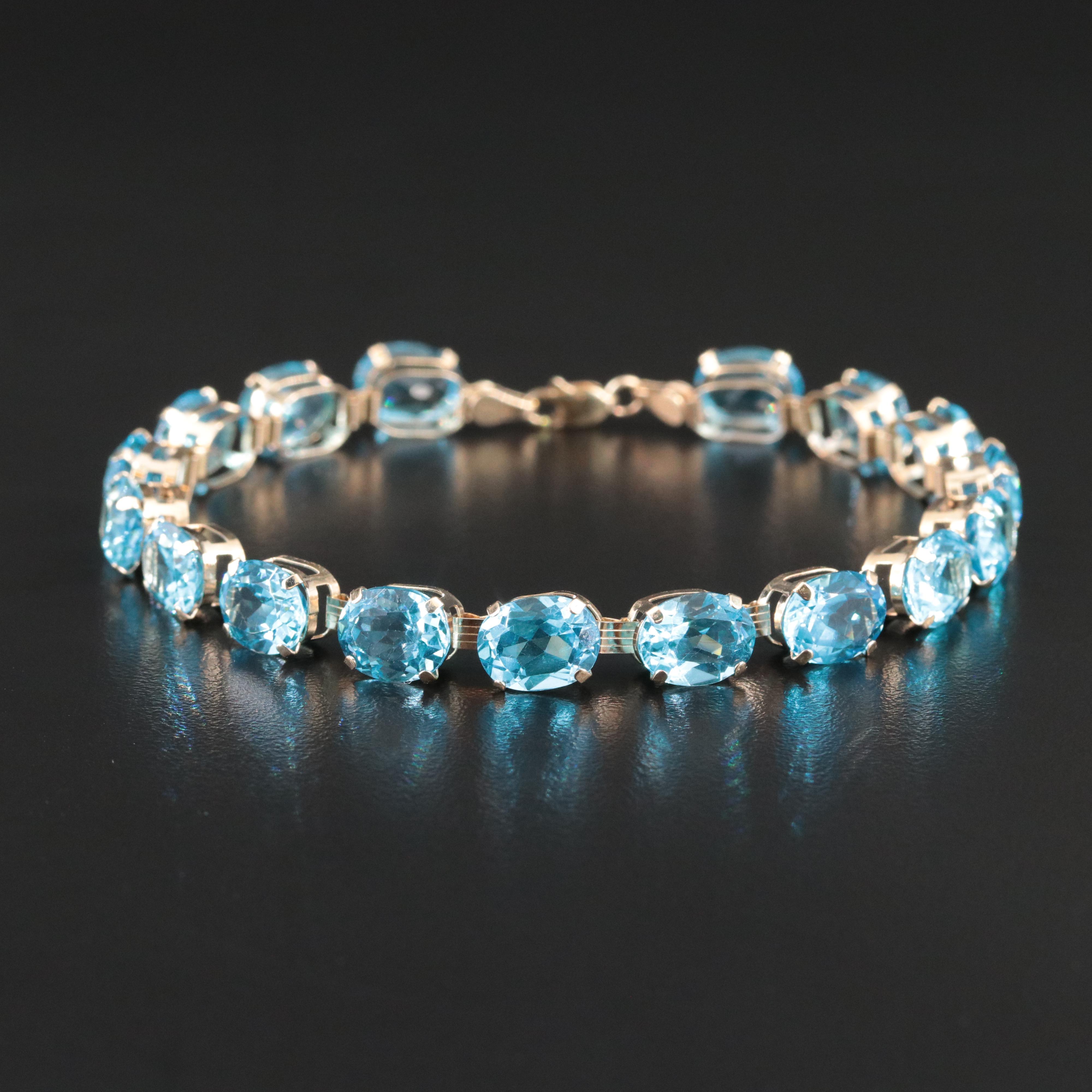 10K Blue Topaz Line Bracelet