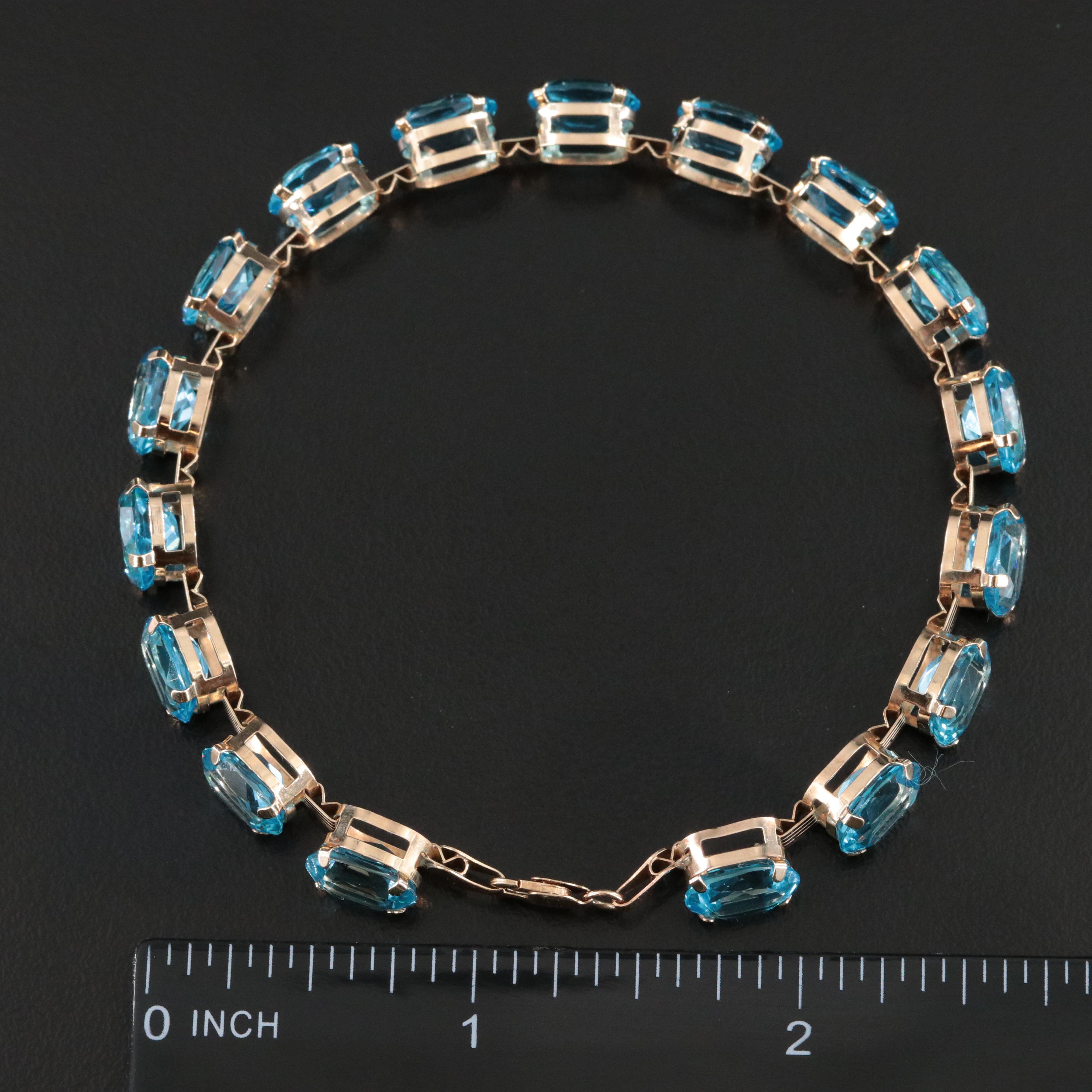 10K Blue Topaz Line Bracelet