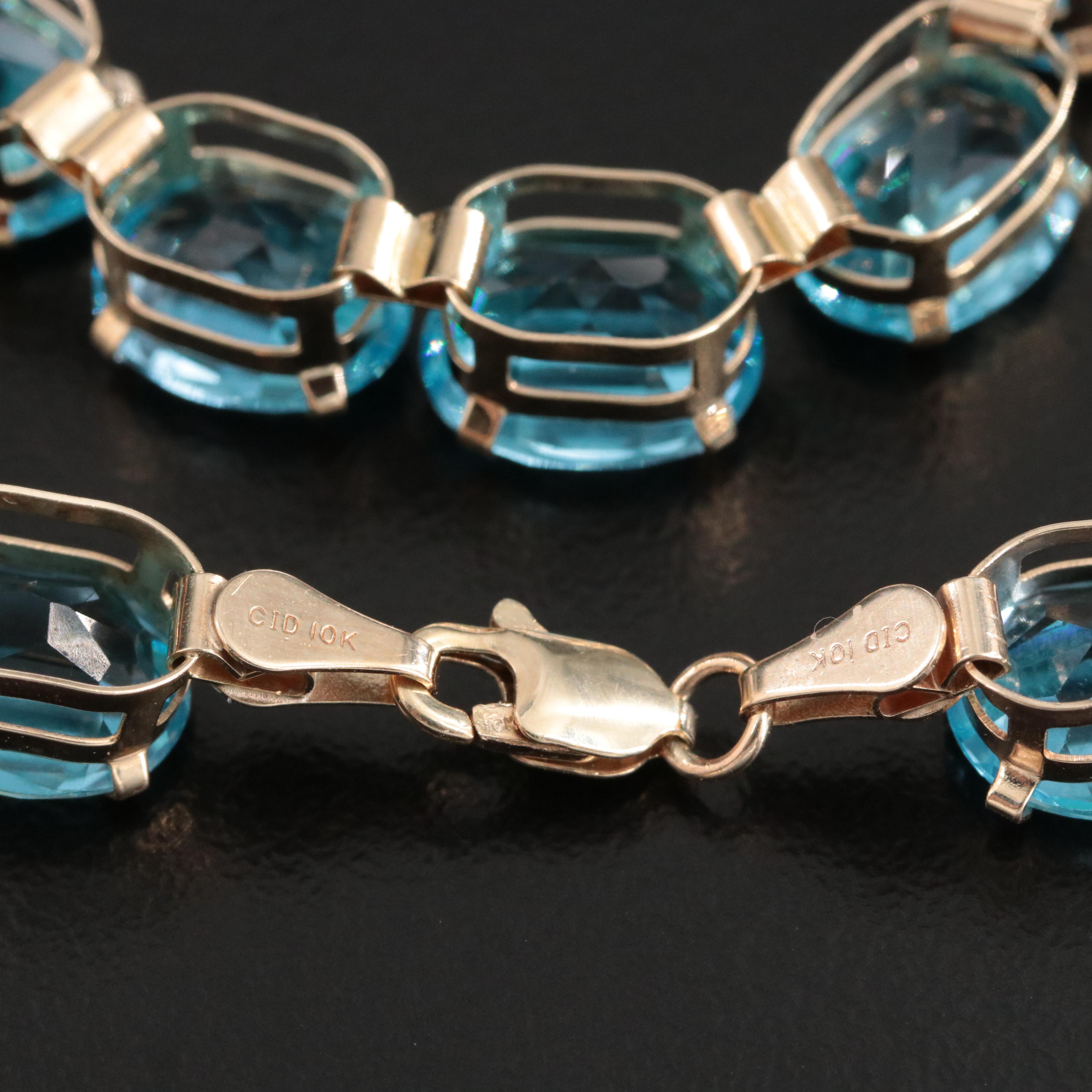 10K Blue Topaz Line Bracelet