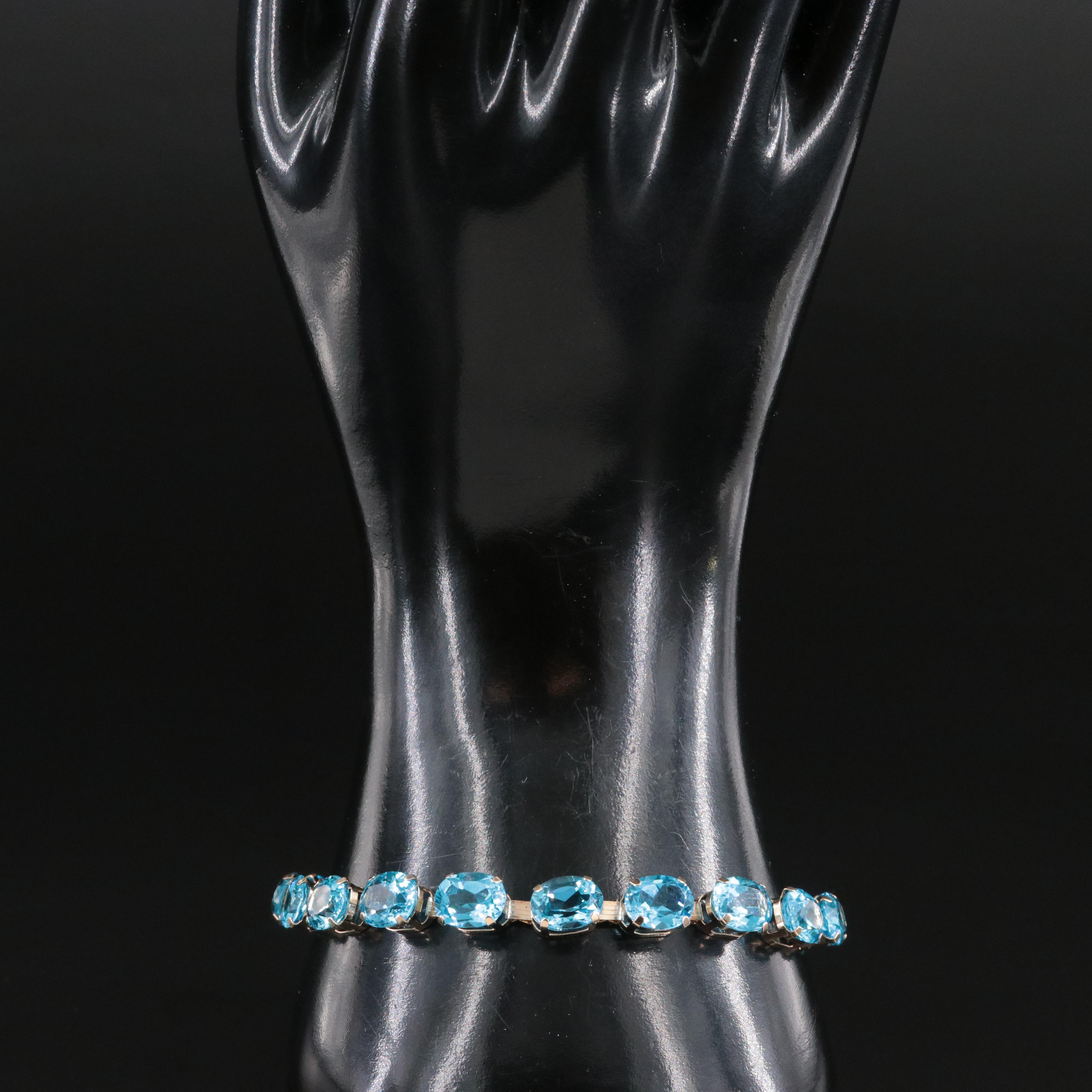 10K Blue Topaz Line Bracelet