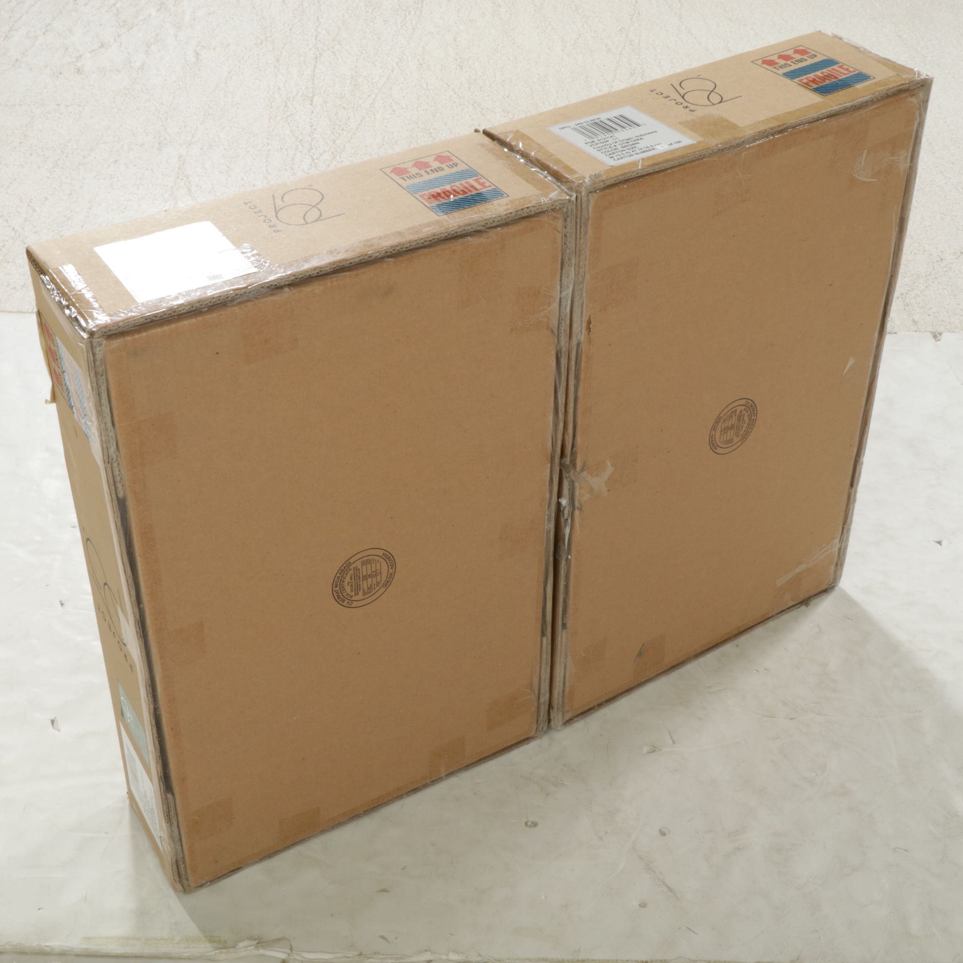 Two Project 62 Tarawitt Natural Finish Modern Cane Ottomans