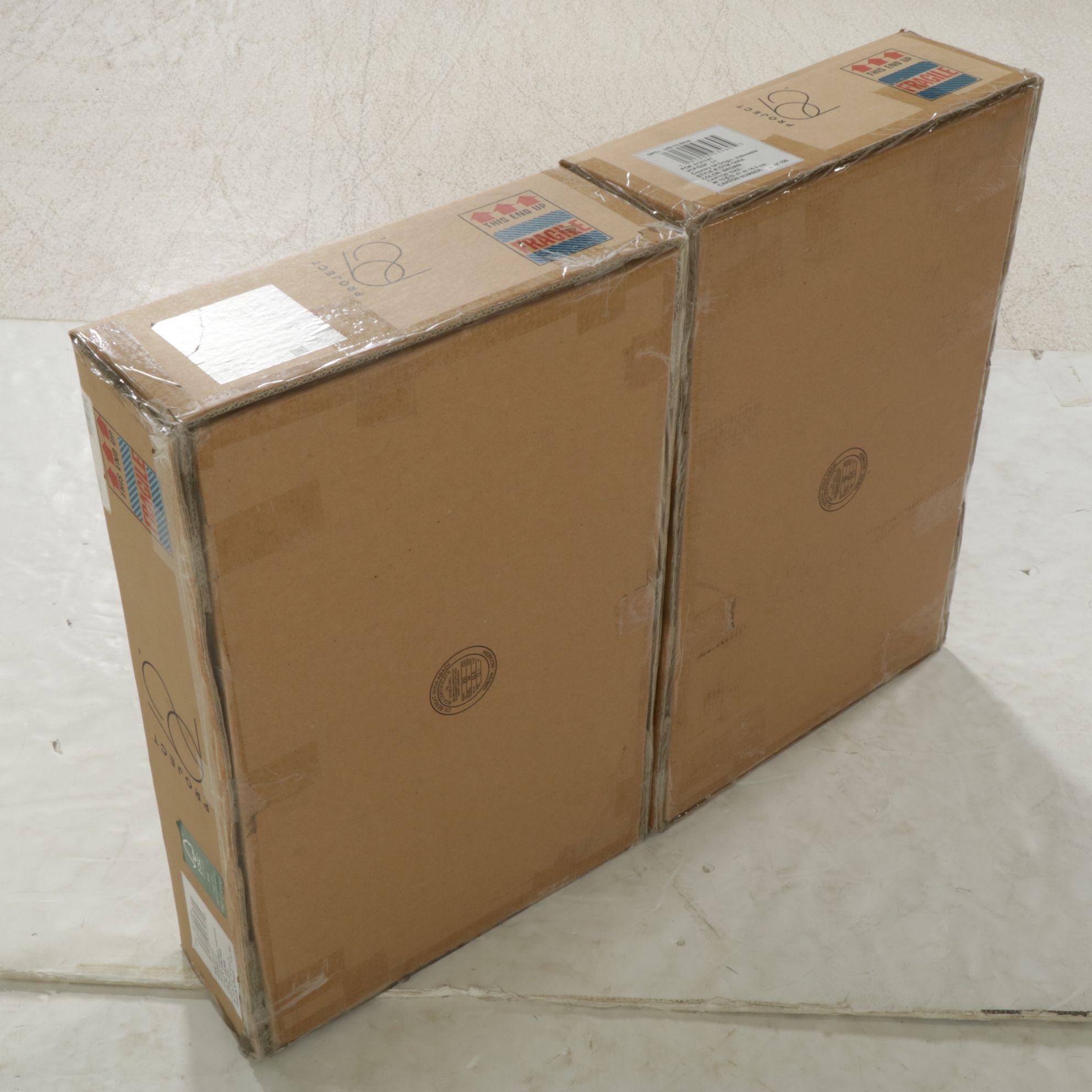 Two Project 62 Tarawitt Natural Finish Modern Cane Ottomans