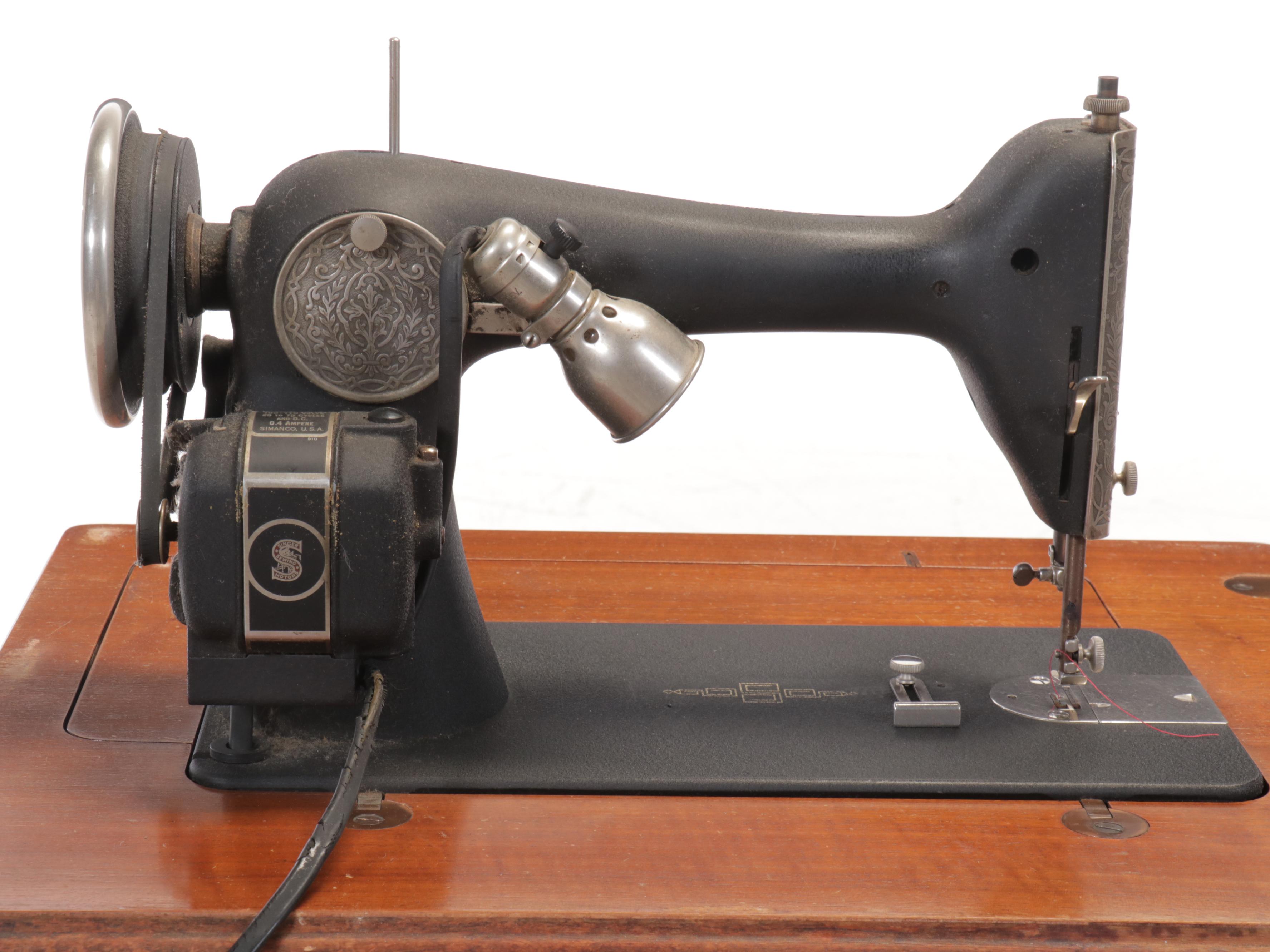 Singer Sewing Machine in Walnut Sewing Table