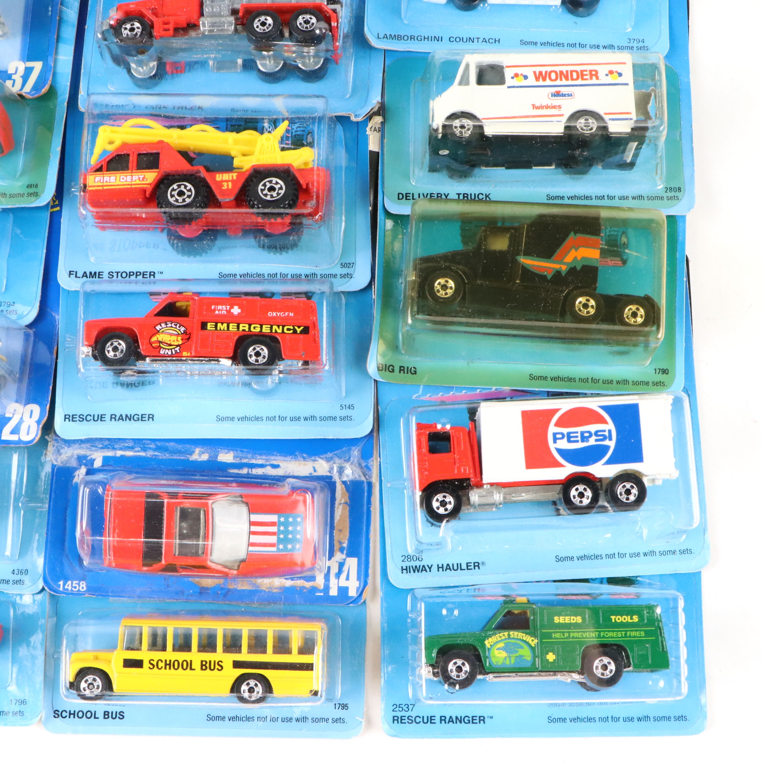 Hot Wheels "Pontiac Fiero 2M4," "Big Rig" and More Toy Cars, 1980s