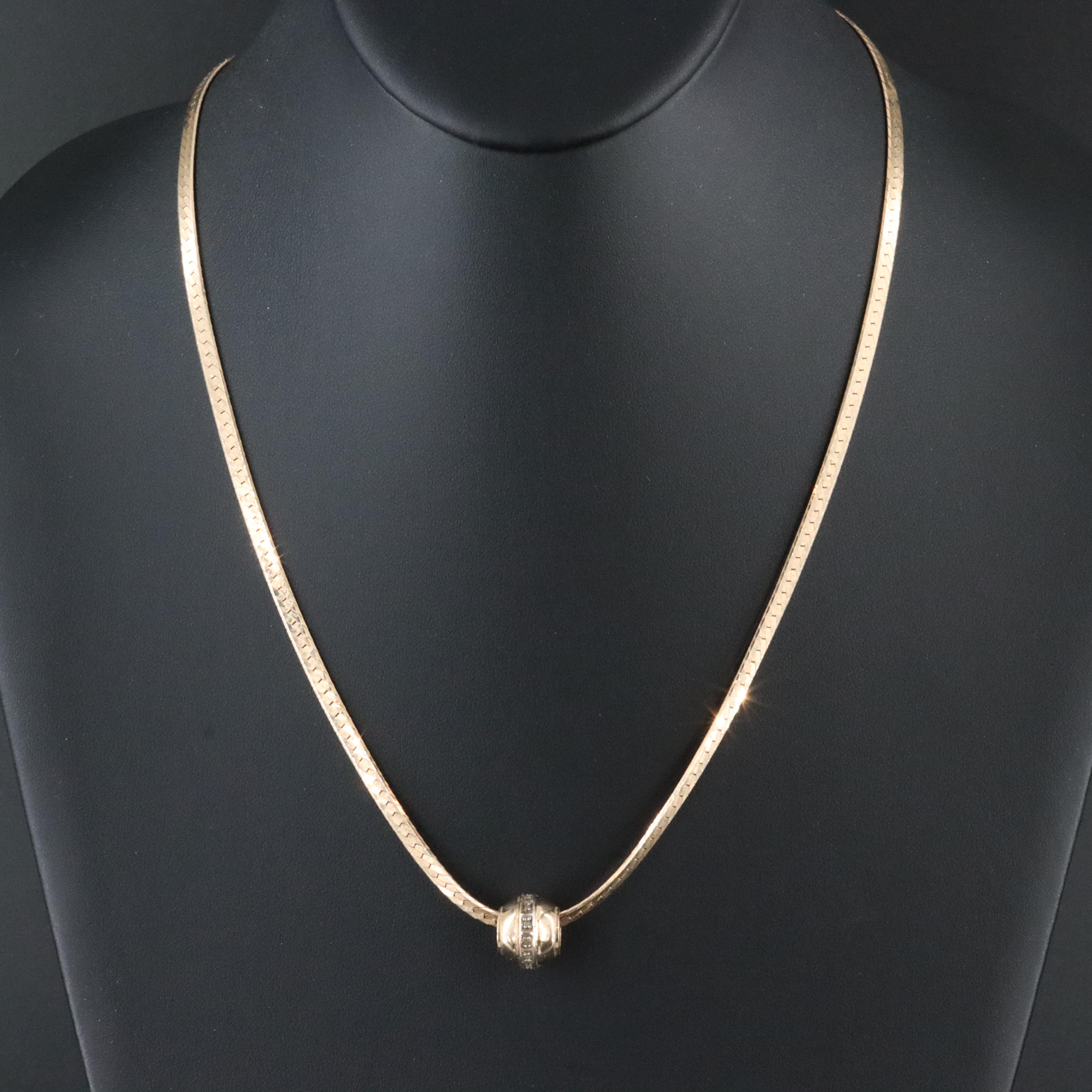 10K Diamond Pendant on 14K Herringbone Chain