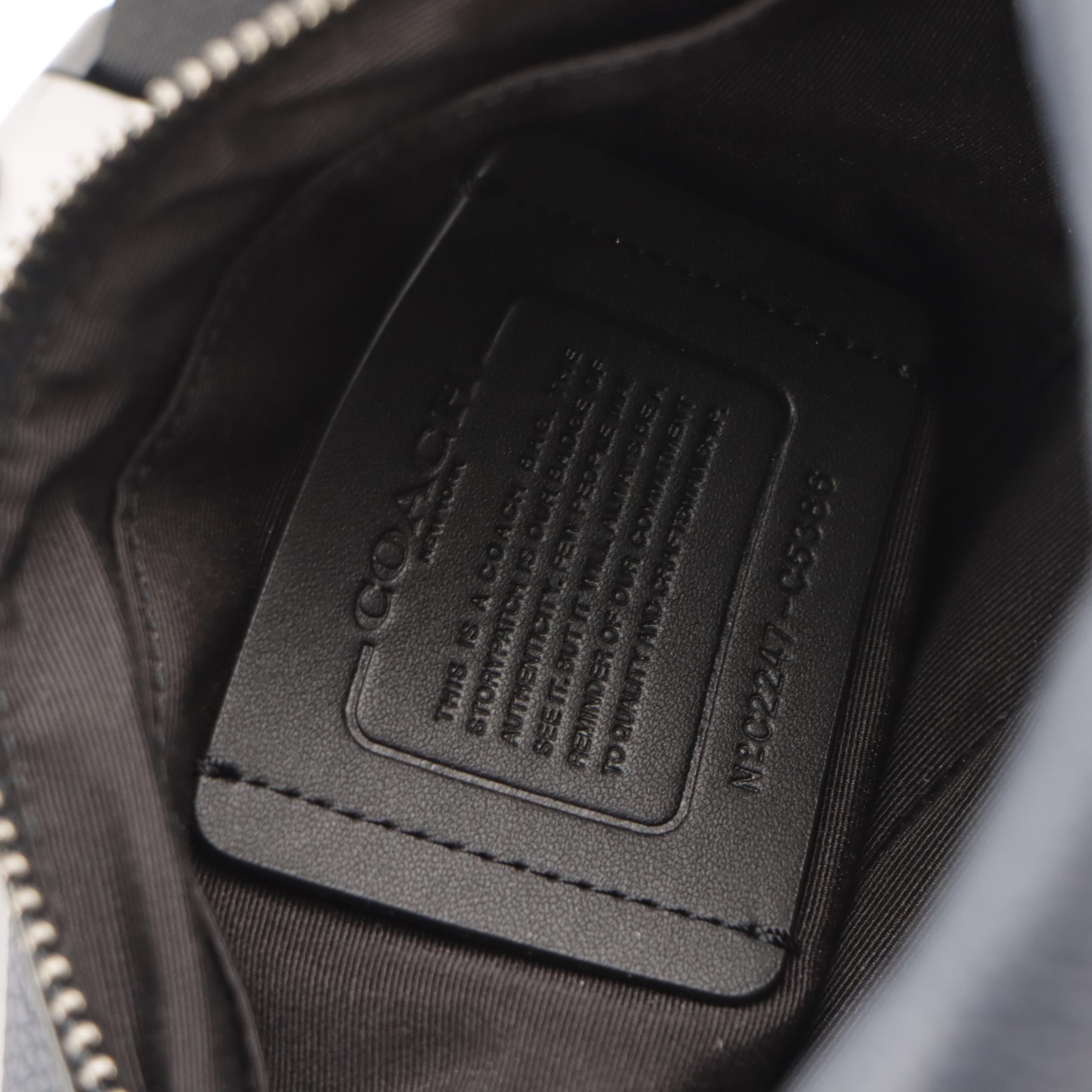 Coach Thompson Convertible Sling Bag in Signature C Striped Canvas and Leather