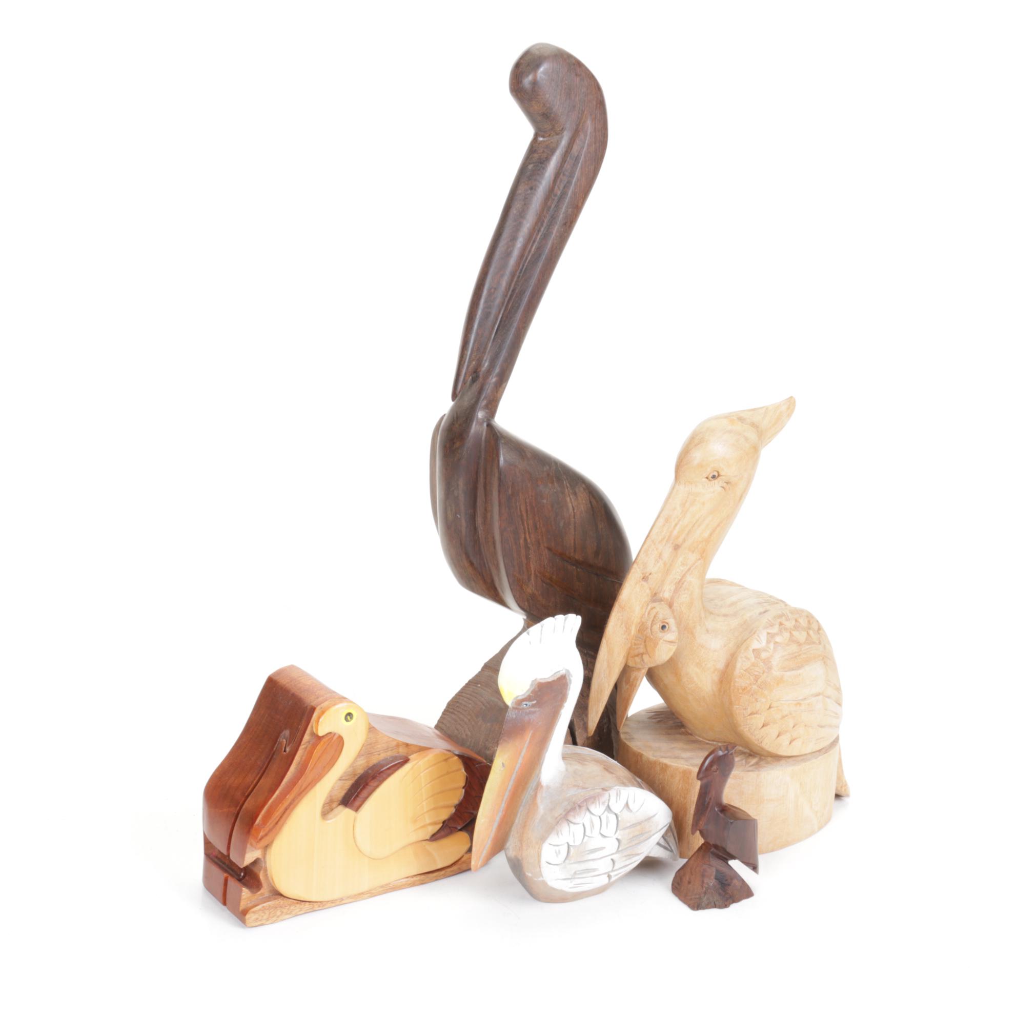 Hand-Carved Wooden Pelican Puzzle Box and Collection of Pelicans