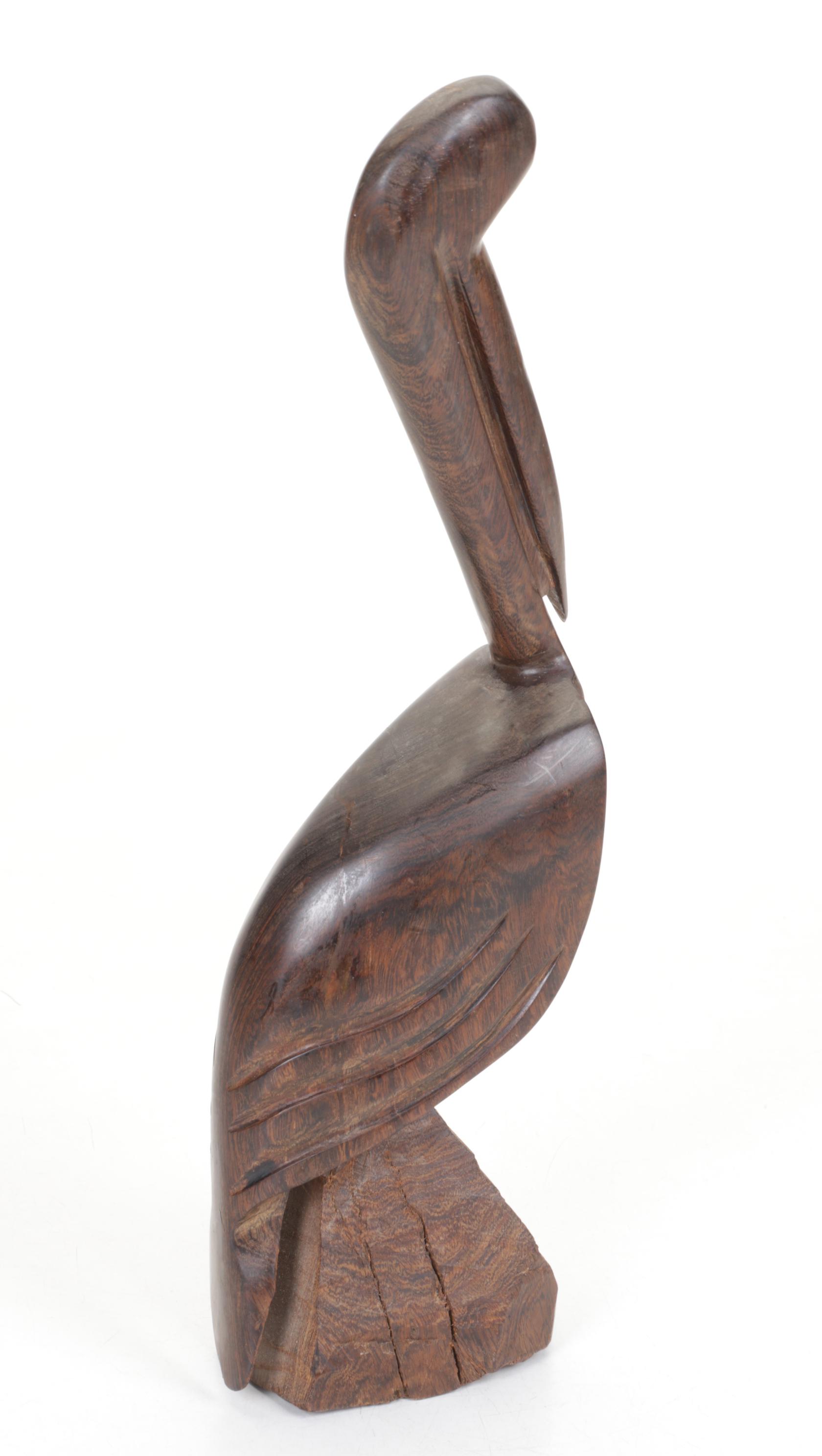 Hand-Carved Wooden Pelican Puzzle Box and Collection of Pelicans