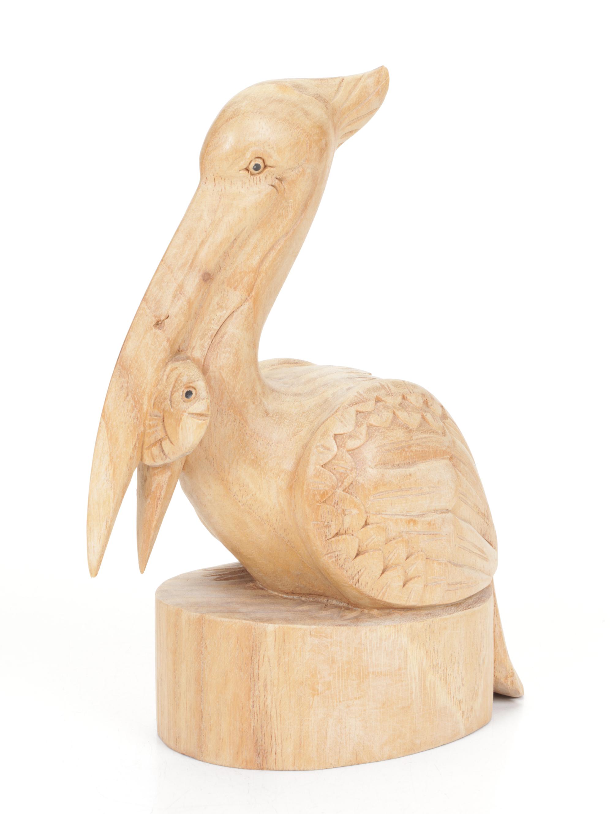 Hand-Carved Wooden Pelican Puzzle Box and Collection of Pelicans