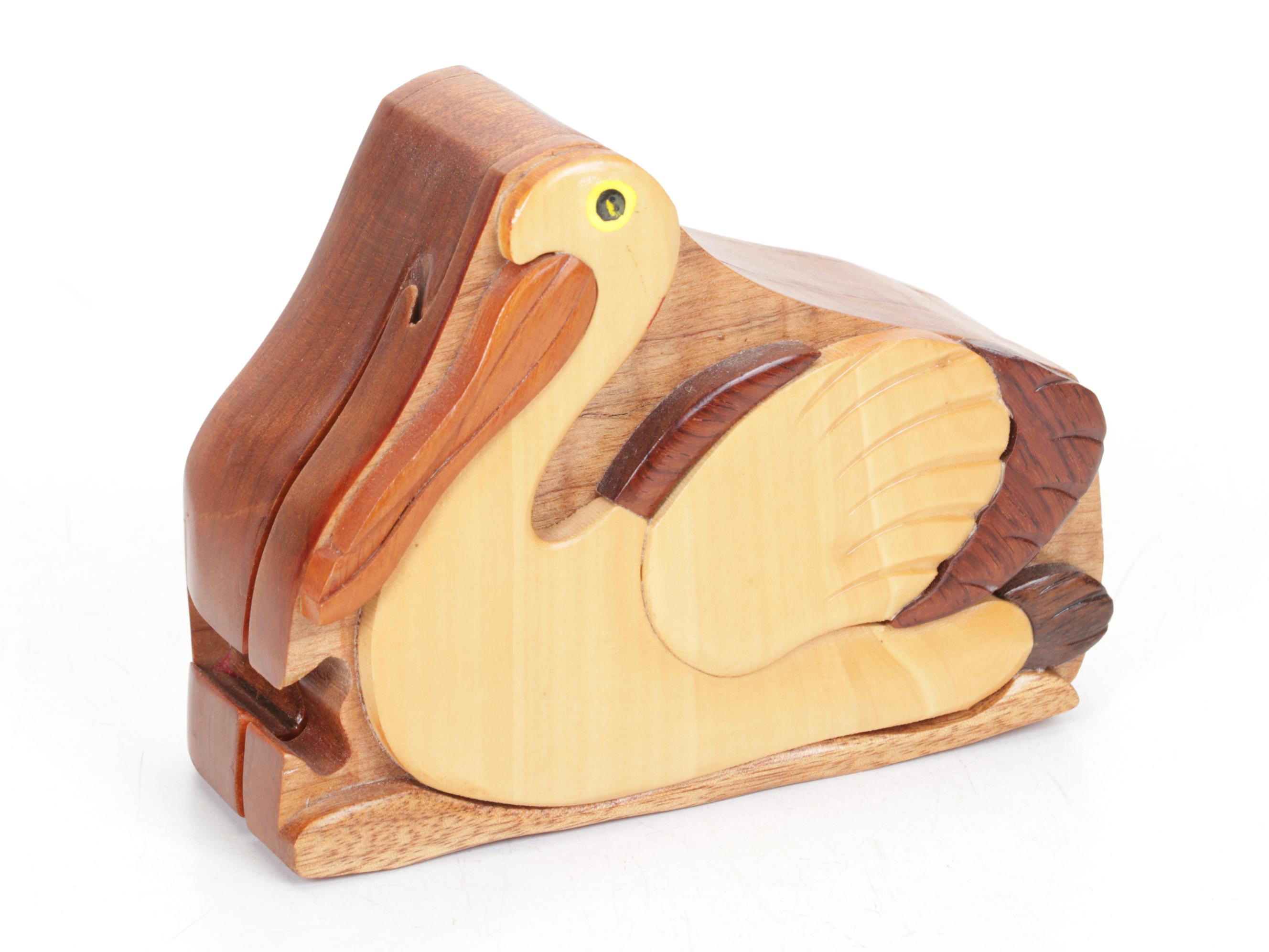 Hand-Carved Wooden Pelican Puzzle Box and Collection of Pelicans