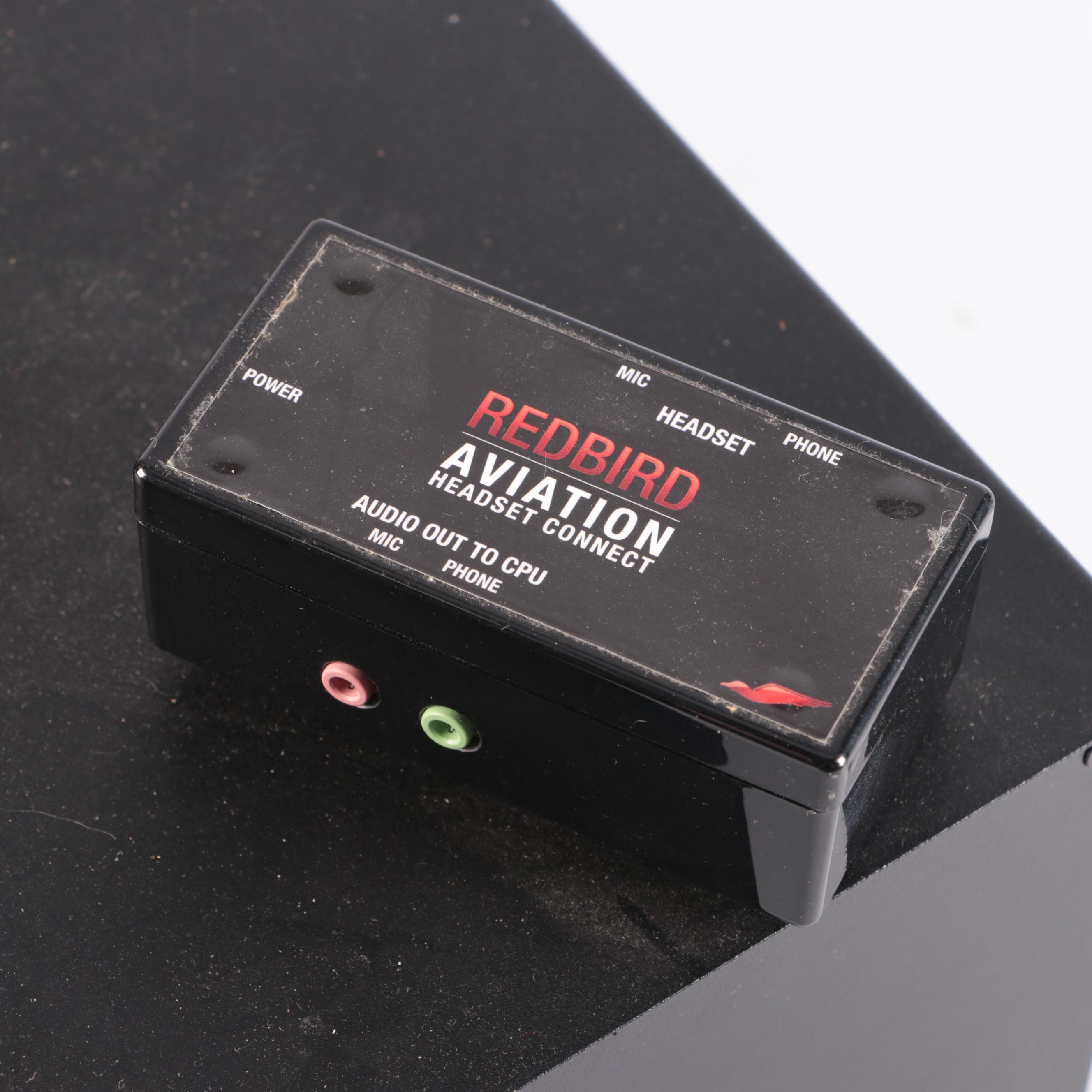 Oculus Rift CV1 VR Headset and Redbird Alloy TH1 Flight Simulator