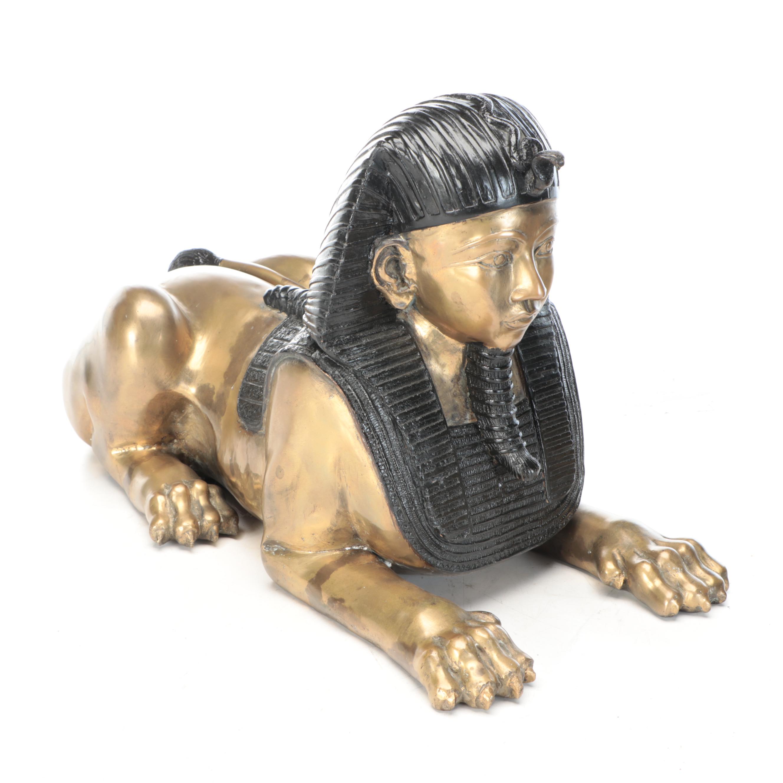 Pair of Egyptian Revival Style Parcel-Painted Brass Sphinxes, 20th Century