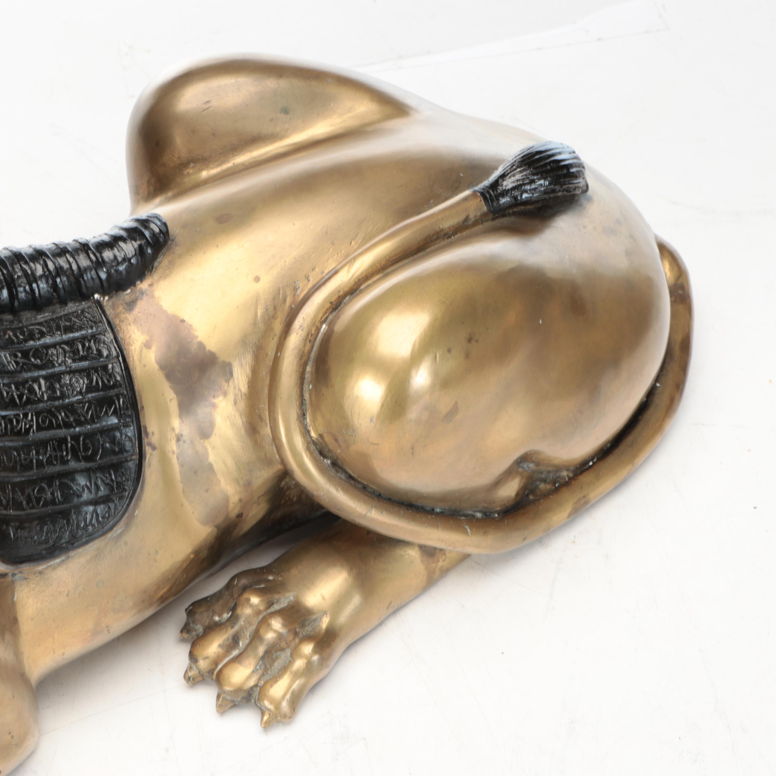 Pair of Egyptian Revival Style Parcel-Painted Brass Sphinxes, 20th Century