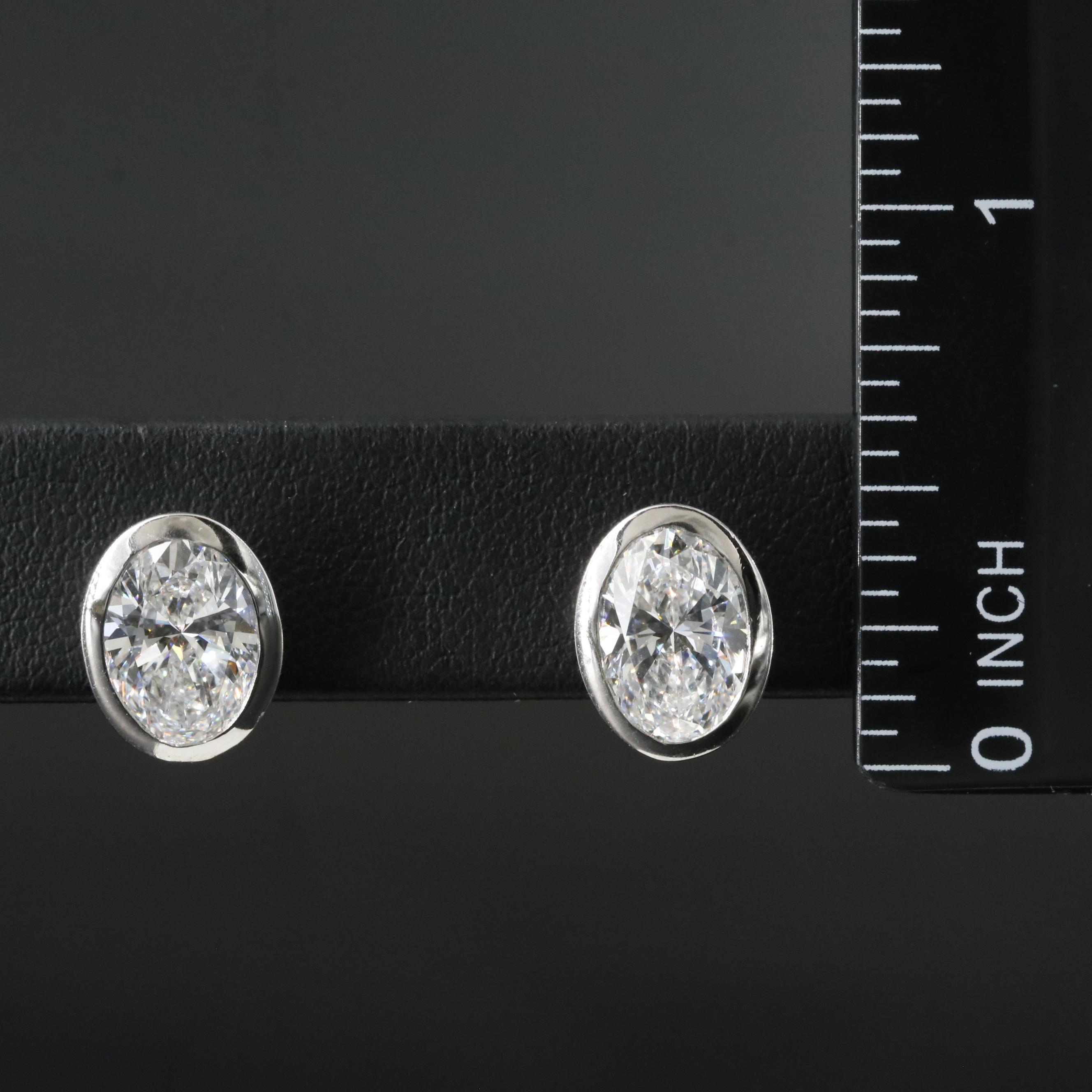 Platinum 4.17 CTW Lab Grown Diamond Solitaire Stud Earrings with IGI Reports