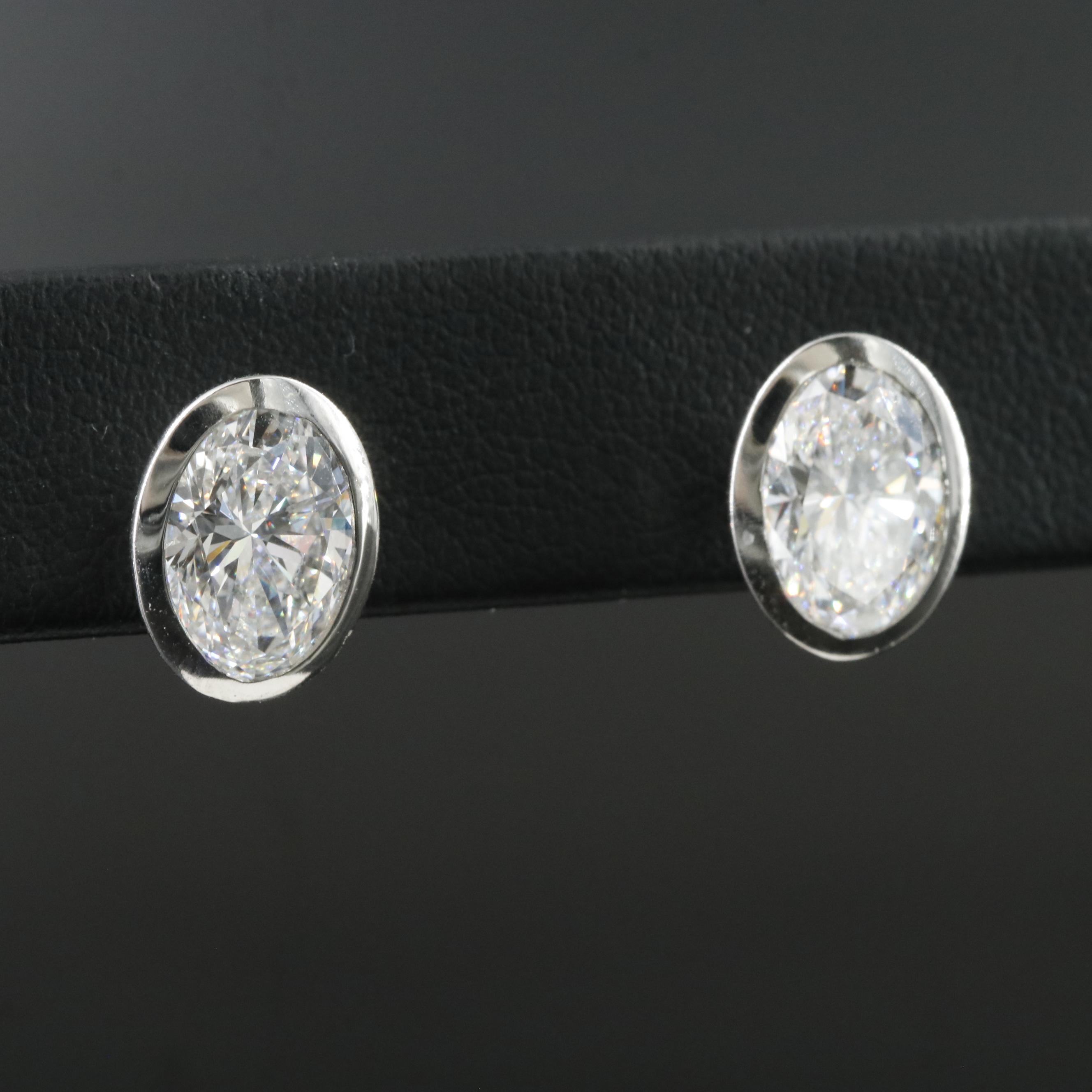 Platinum 4.17 CTW Lab Grown Diamond Solitaire Stud Earrings with IGI Reports