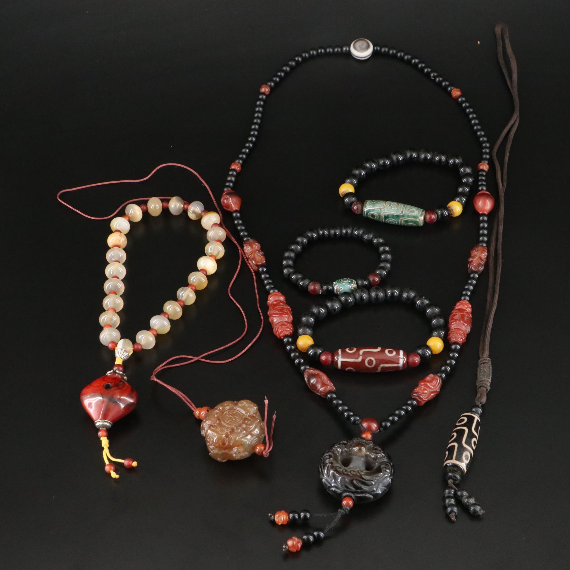 Black Onyx, Carnelian and Prayer Beads Featured in Necklaces and Bracelets