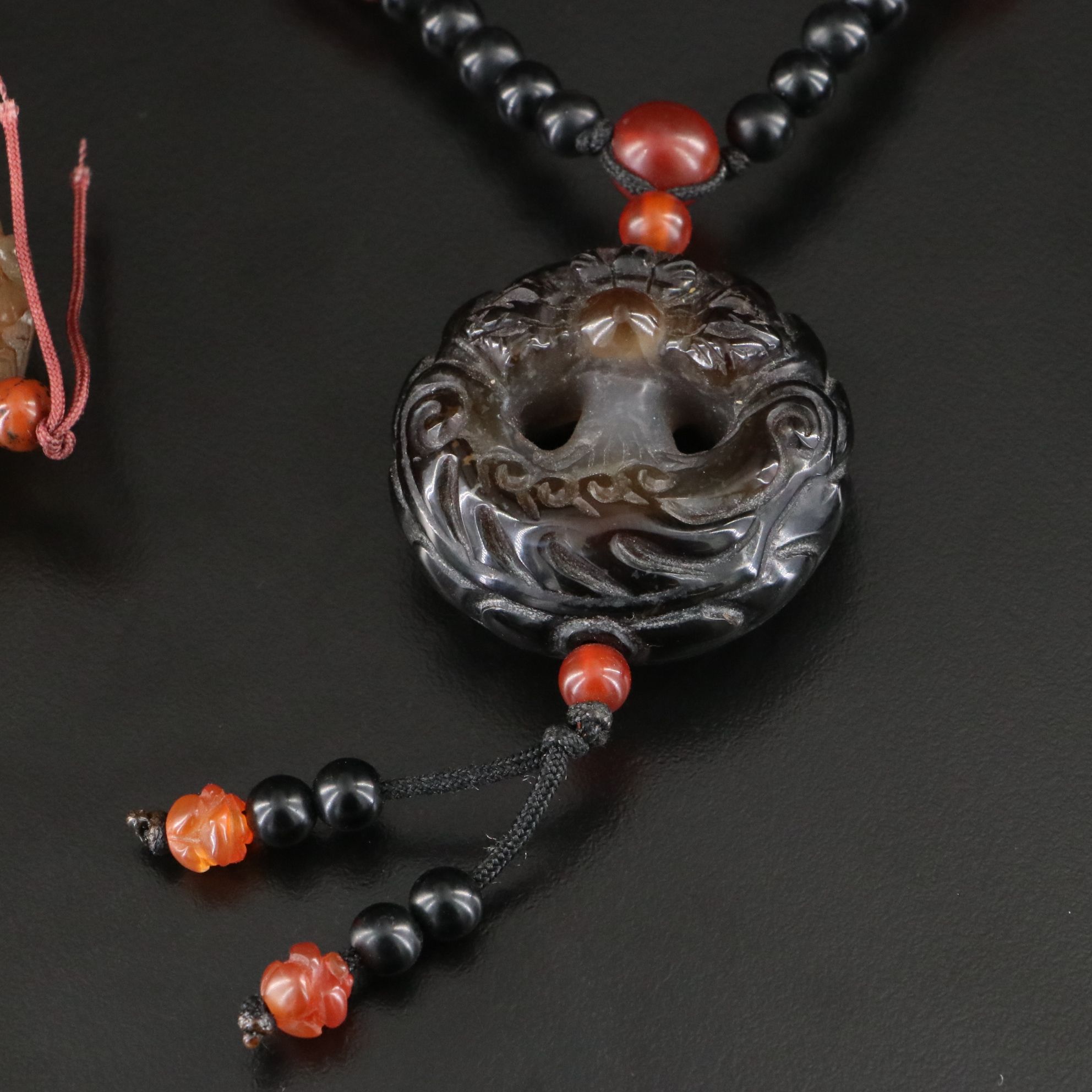 Black Onyx, Carnelian and Prayer Beads Featured in Necklaces and Bracelets