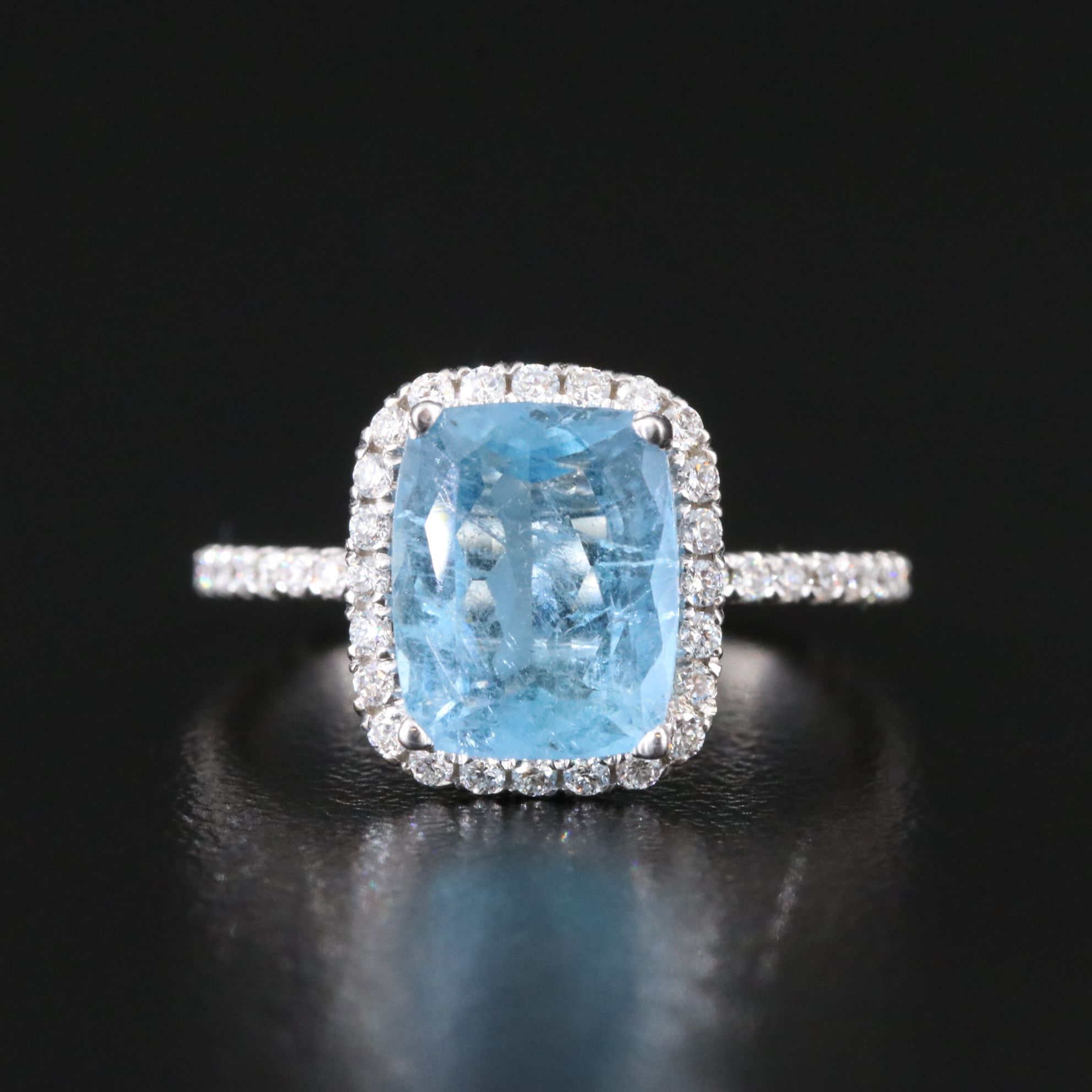 18K Aquamarine and 0.57 CTW Diamond Halo Ring