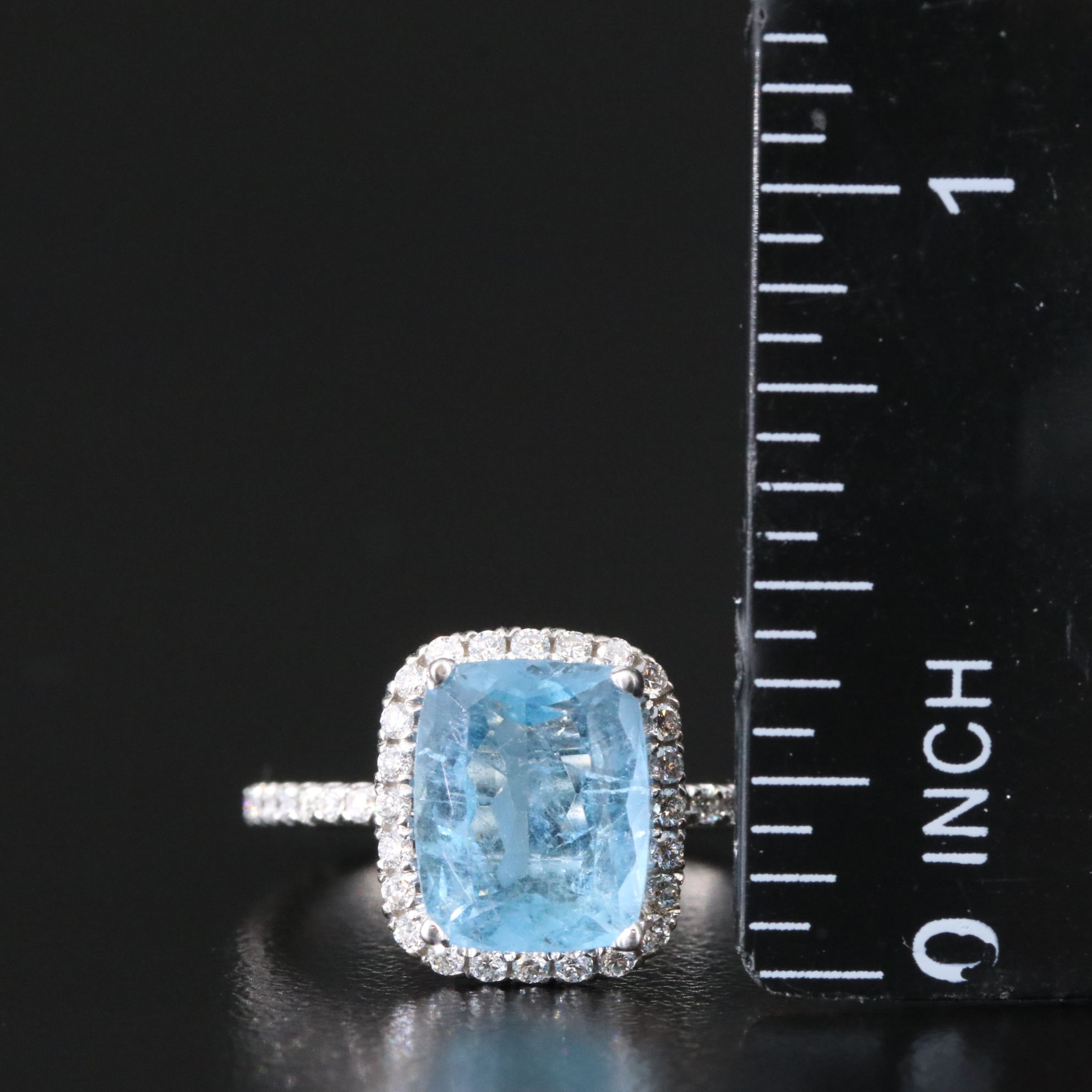 18K Aquamarine and 0.57 CTW Diamond Halo Ring