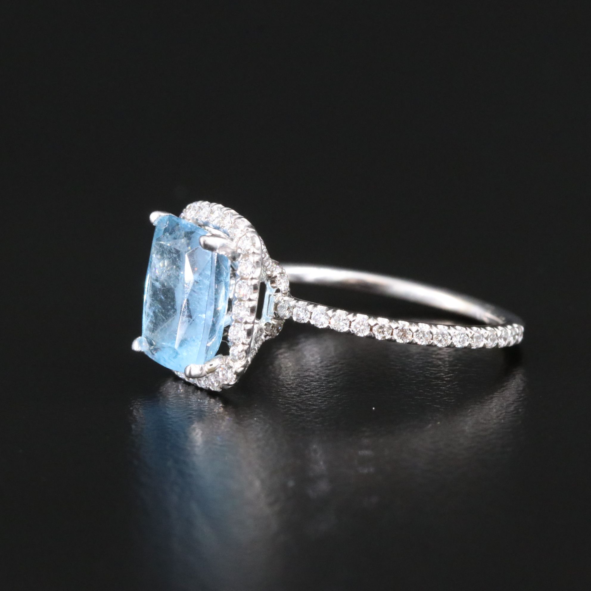 18K Aquamarine and 0.57 CTW Diamond Halo Ring