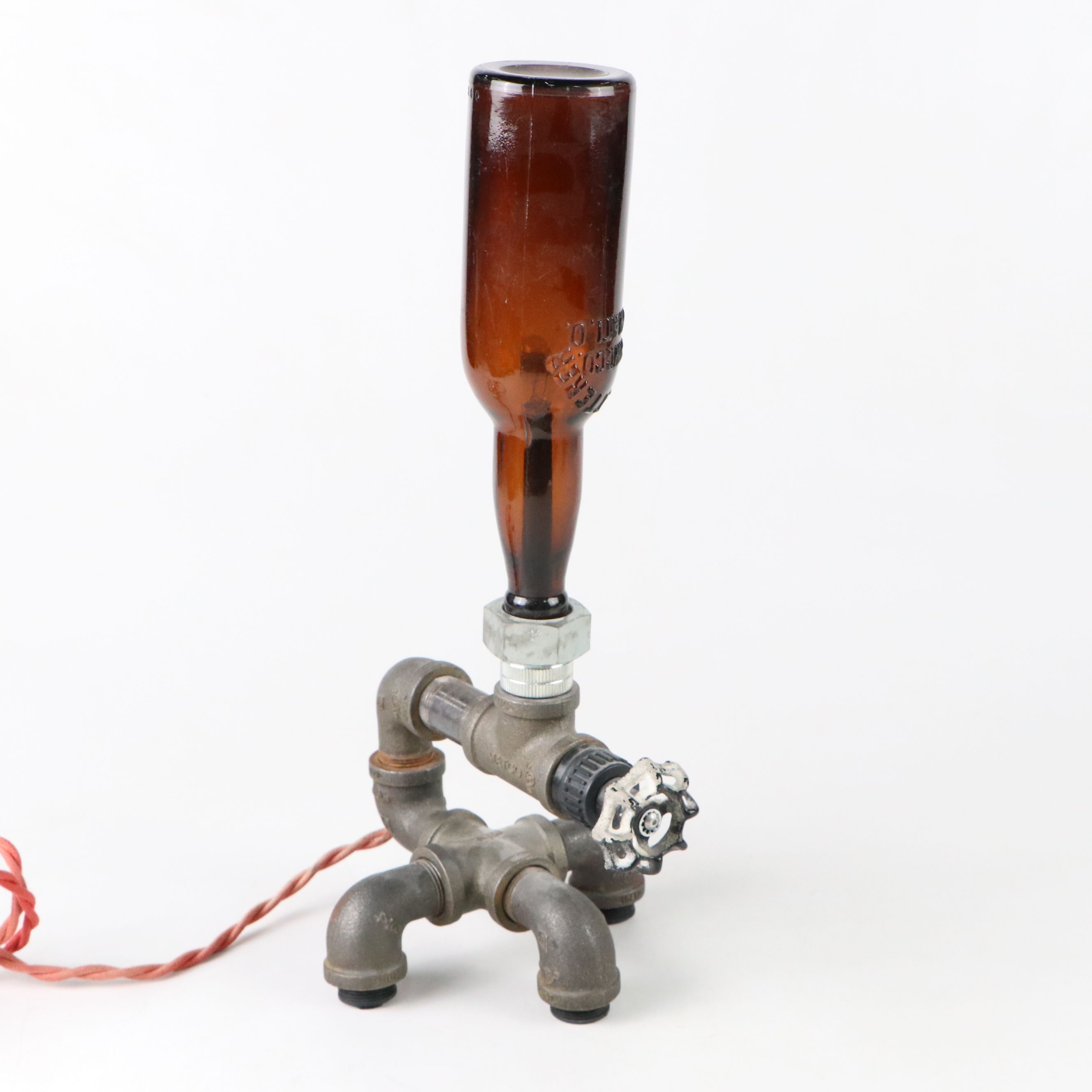 Industrial Modern Spigot Lamp with Amber Bottle Shade