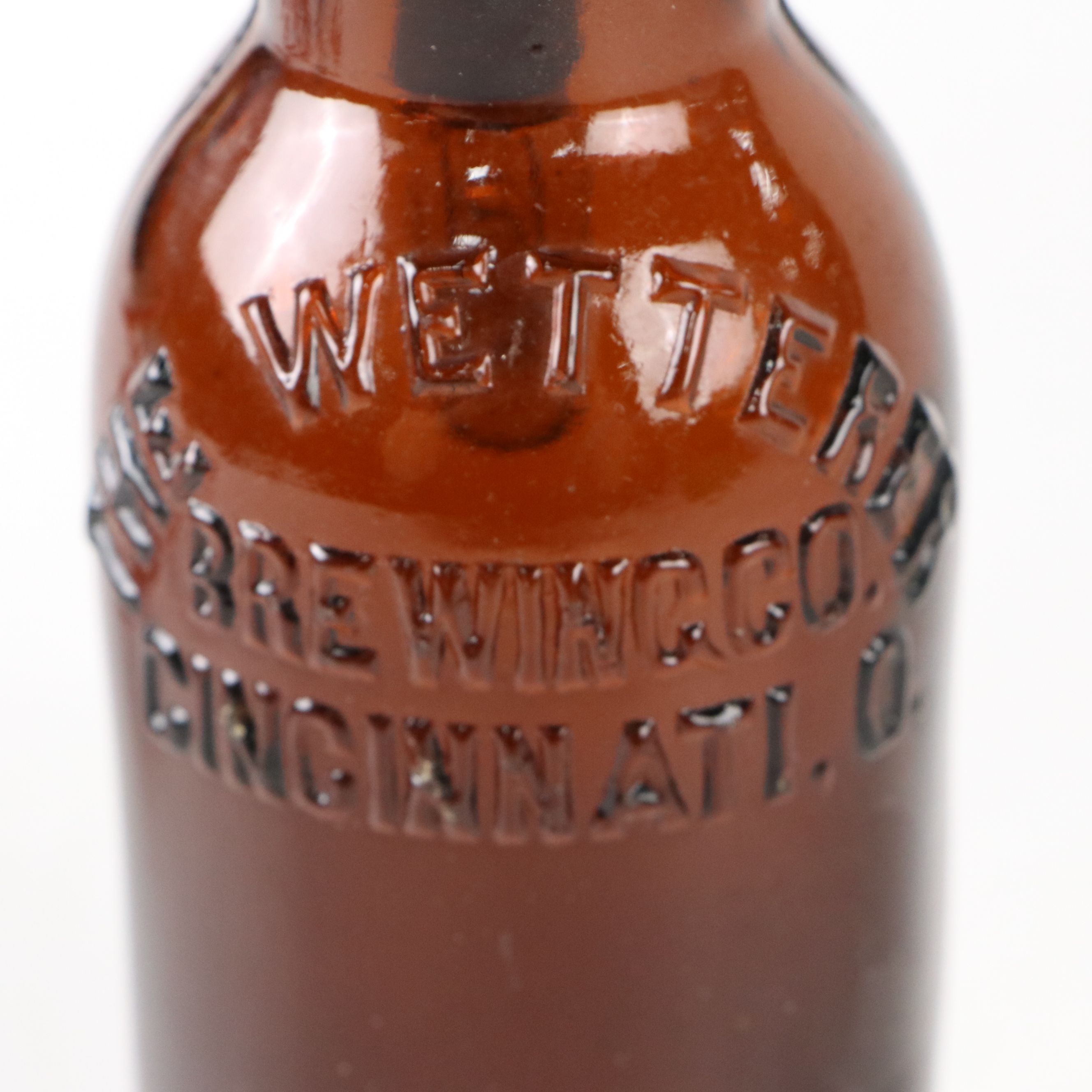 Industrial Modern Spigot Lamp with Amber Bottle Shade