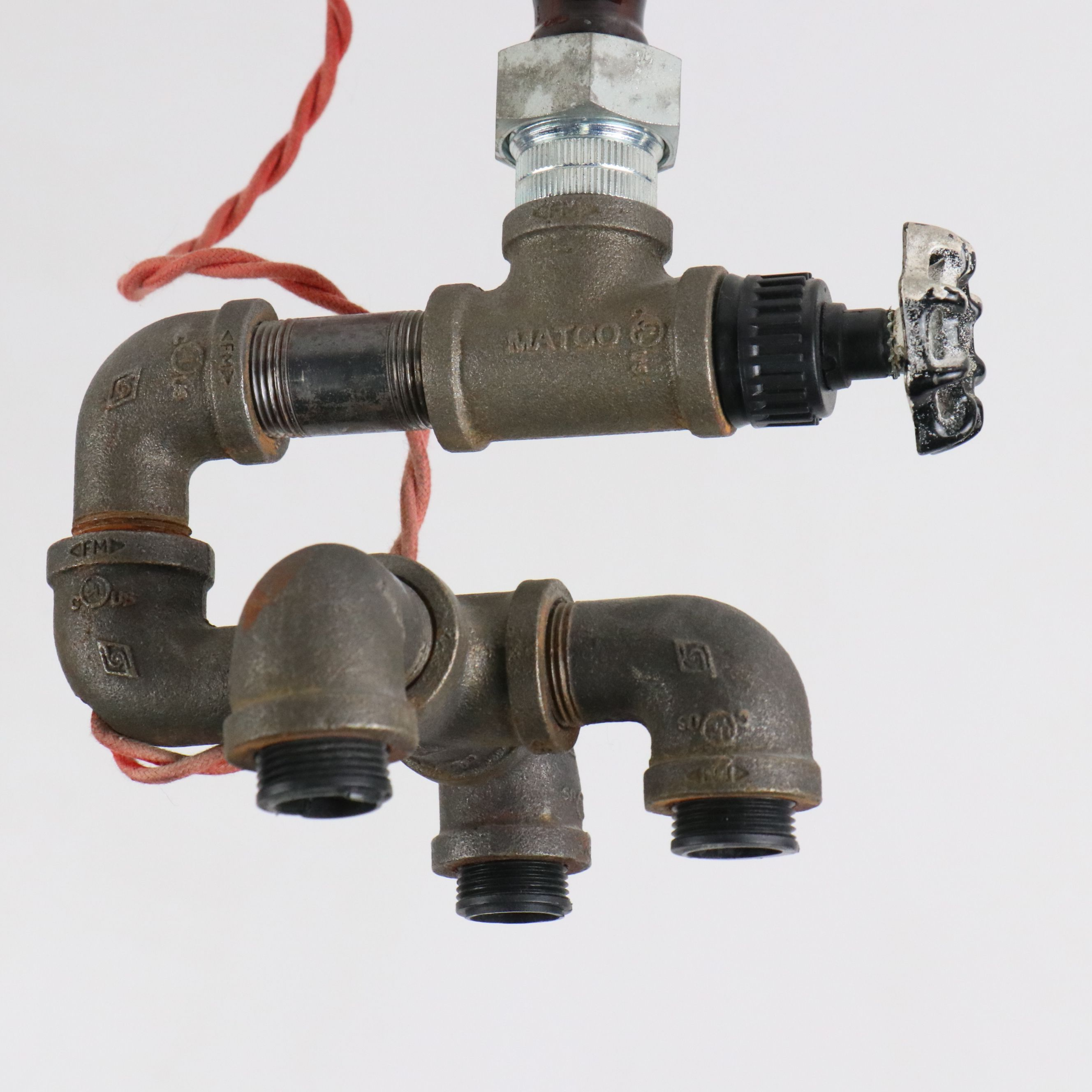 Industrial Modern Spigot Lamp with Amber Bottle Shade