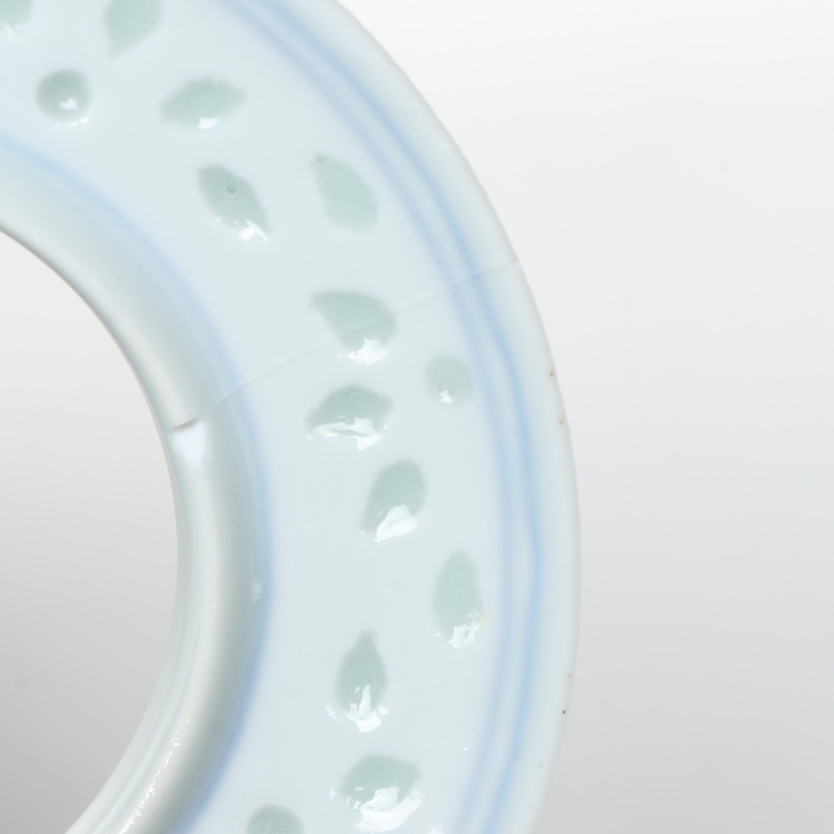 Japanese and Chinese Porcelain Bowls, Soup Spoons, and Plates