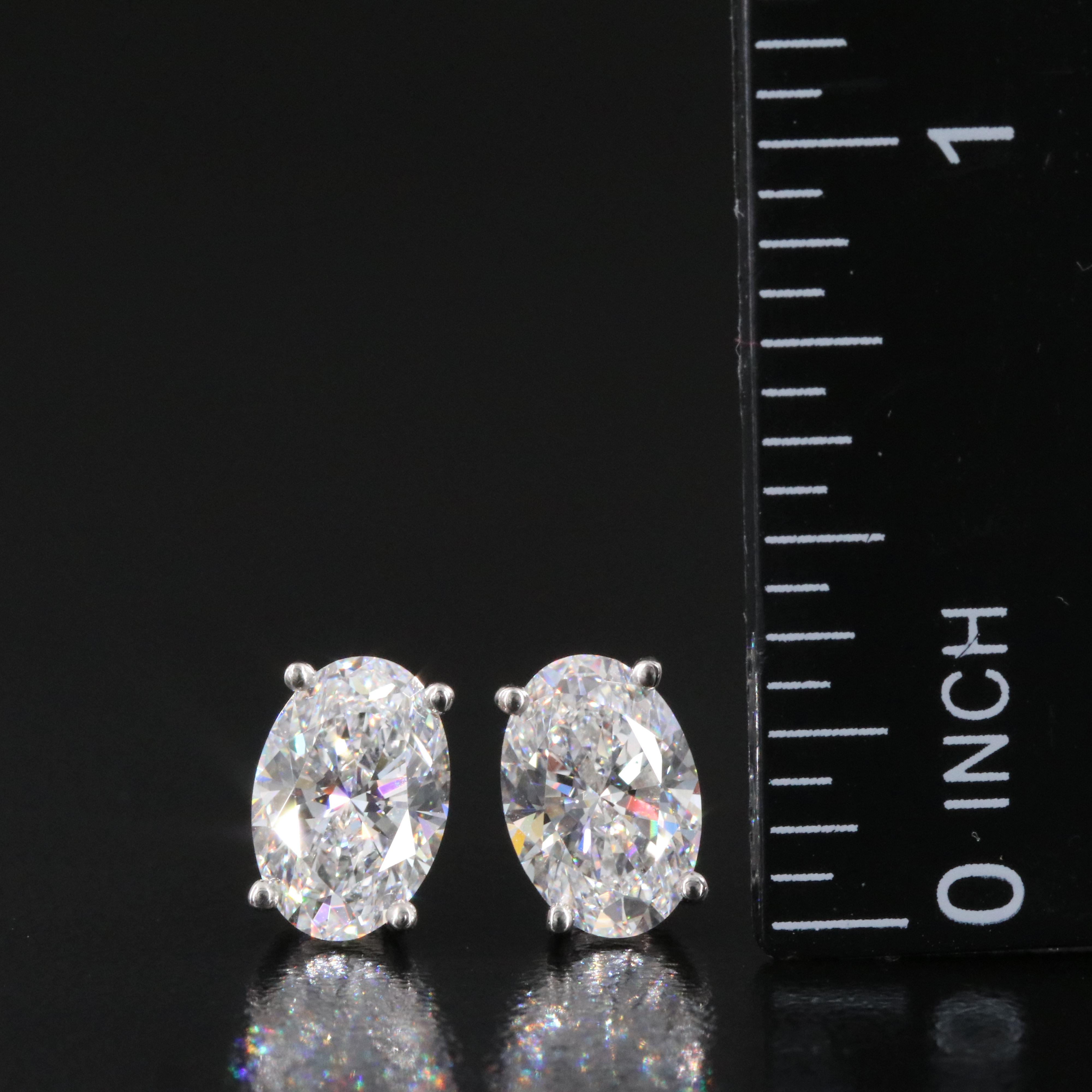 Platinum 3.18 CTW Lab Grown Diamond Solitaire Stud Earrings with IGI Report