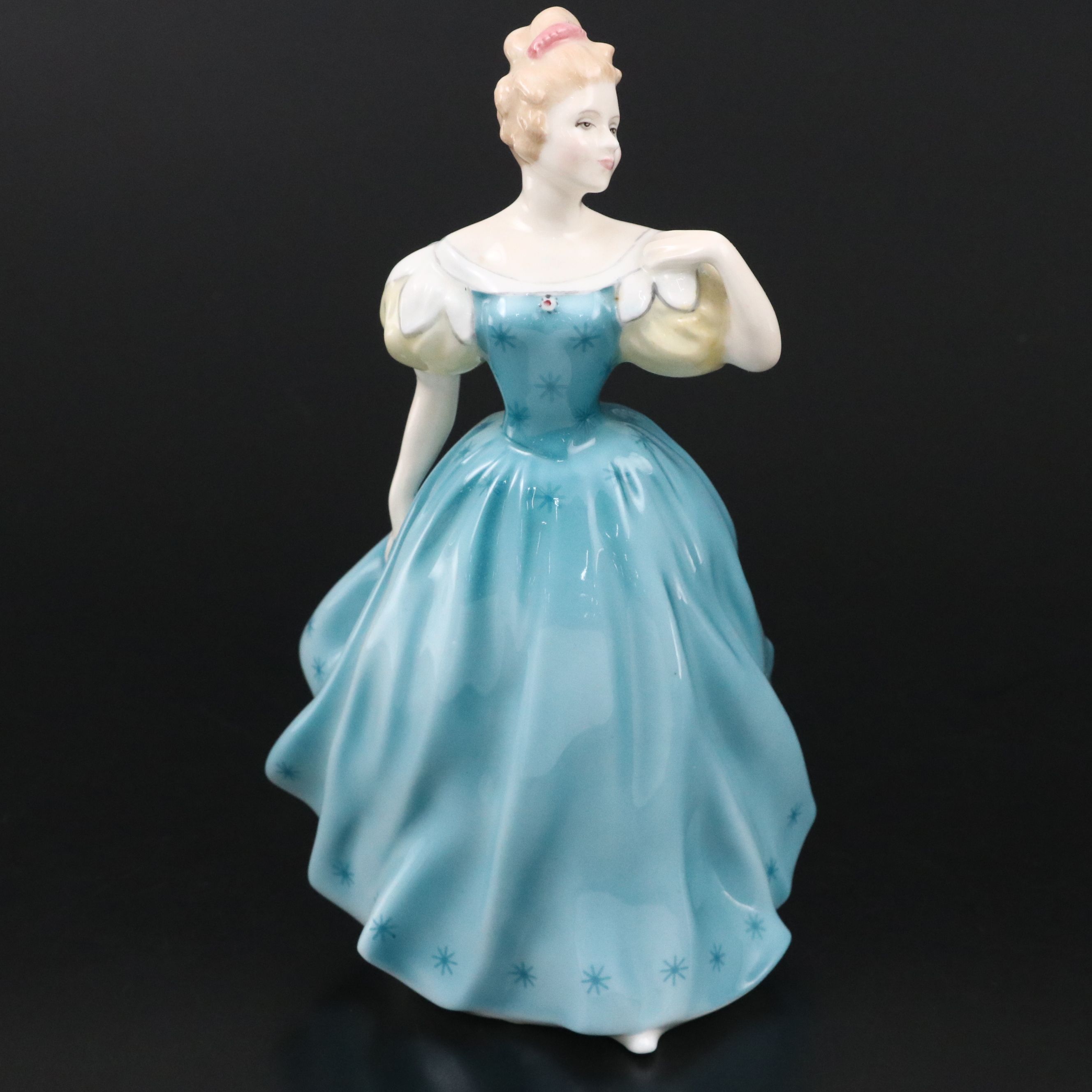 Lladró "Attentive Bunny with Flowers" and Royal Doulton "Enchantment" Figurines