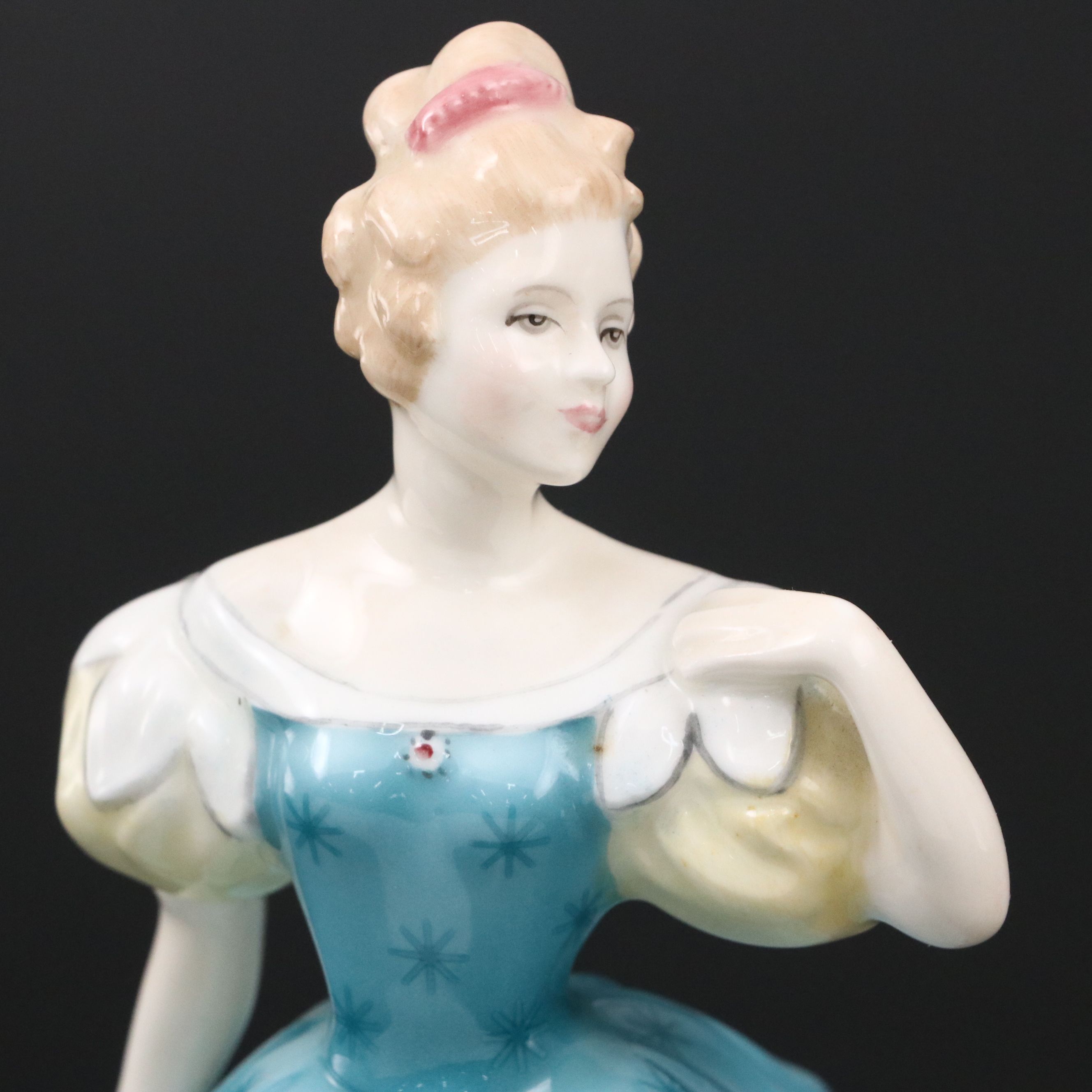 Lladró "Attentive Bunny with Flowers" and Royal Doulton "Enchantment" Figurines