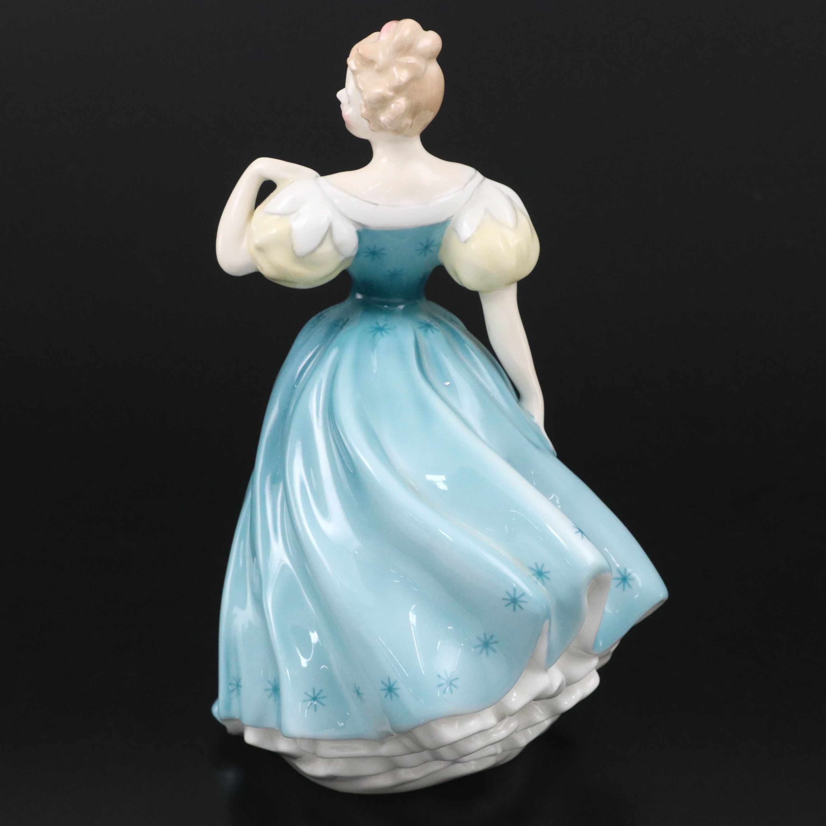 Lladró "Attentive Bunny with Flowers" and Royal Doulton "Enchantment" Figurines
