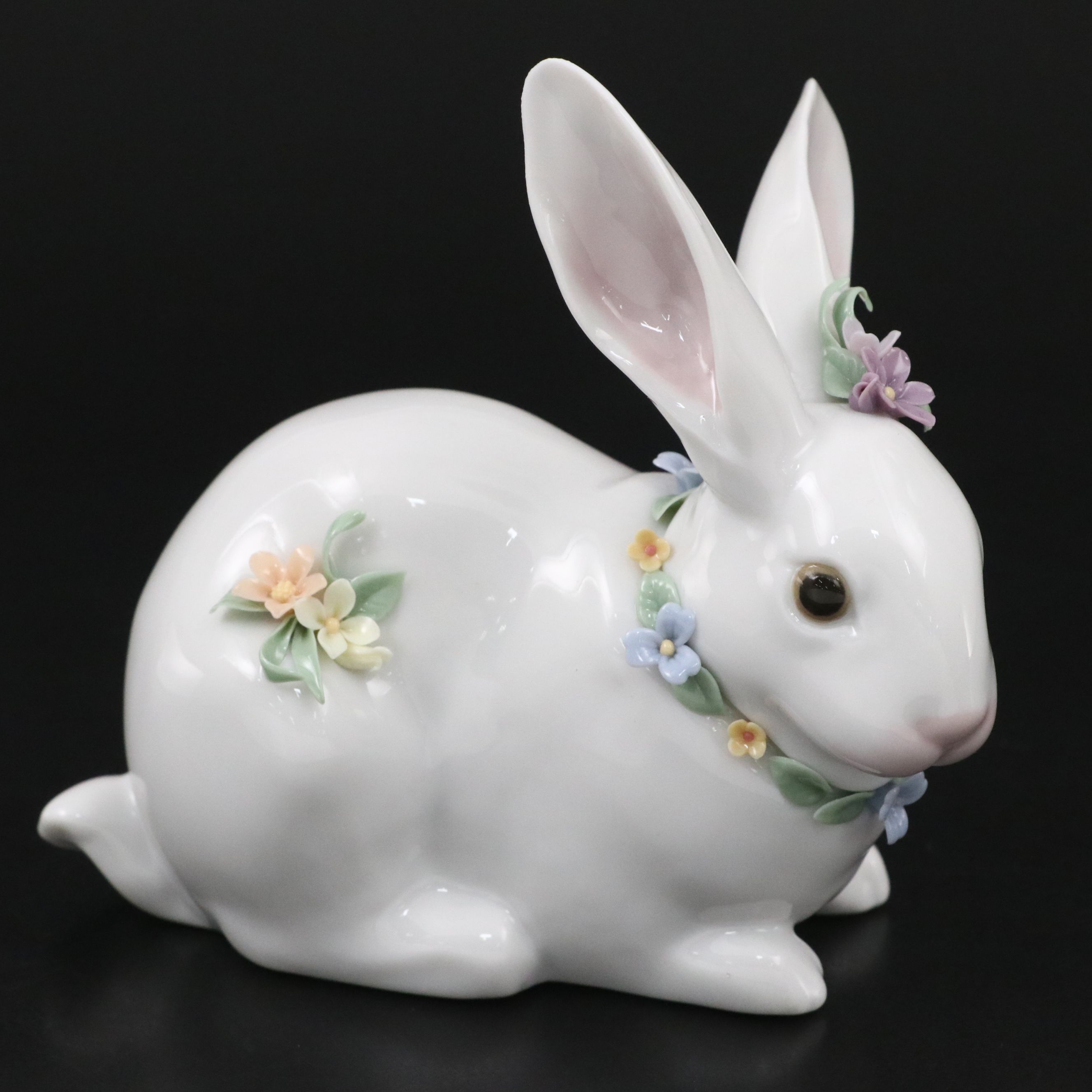 Lladró "Attentive Bunny with Flowers" and Royal Doulton "Enchantment" Figurines