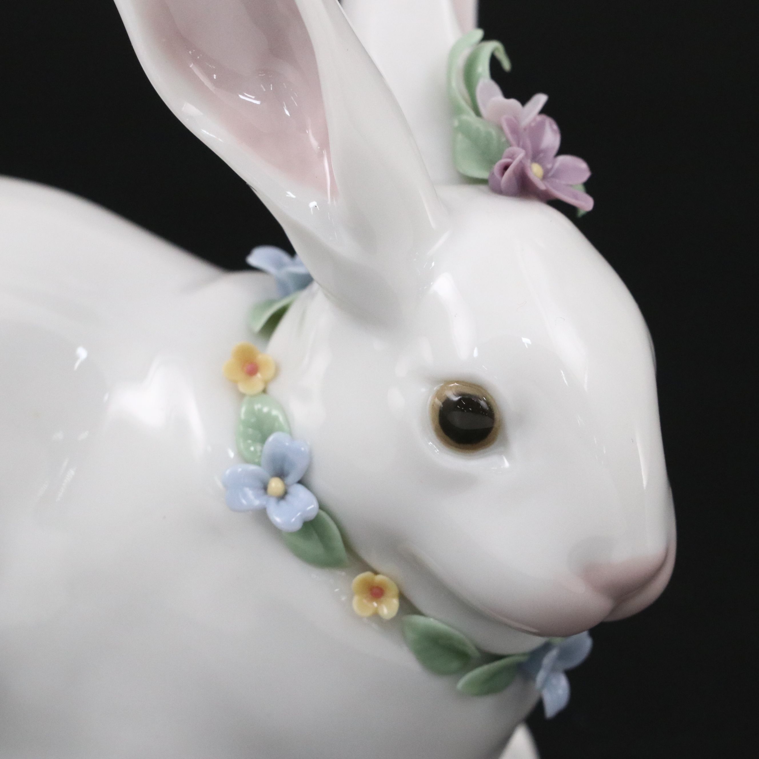 Lladró "Attentive Bunny with Flowers" and Royal Doulton "Enchantment" Figurines