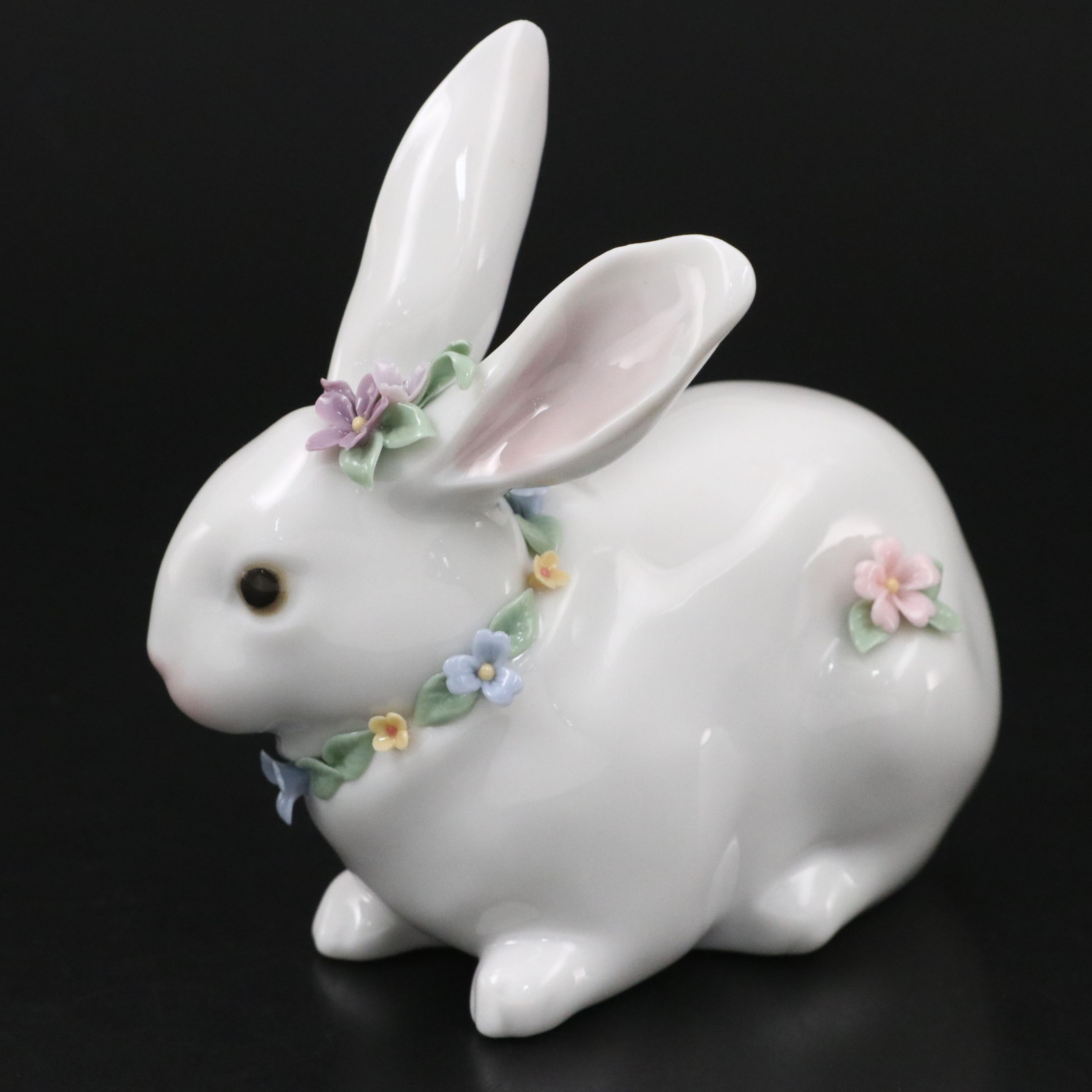 Lladró "Attentive Bunny with Flowers" and Royal Doulton "Enchantment" Figurines