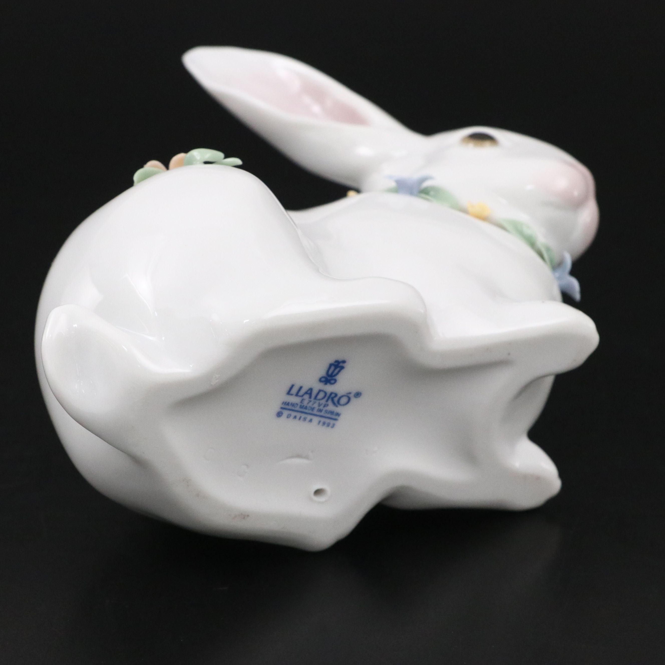 Lladró "Attentive Bunny with Flowers" and Royal Doulton "Enchantment" Figurines