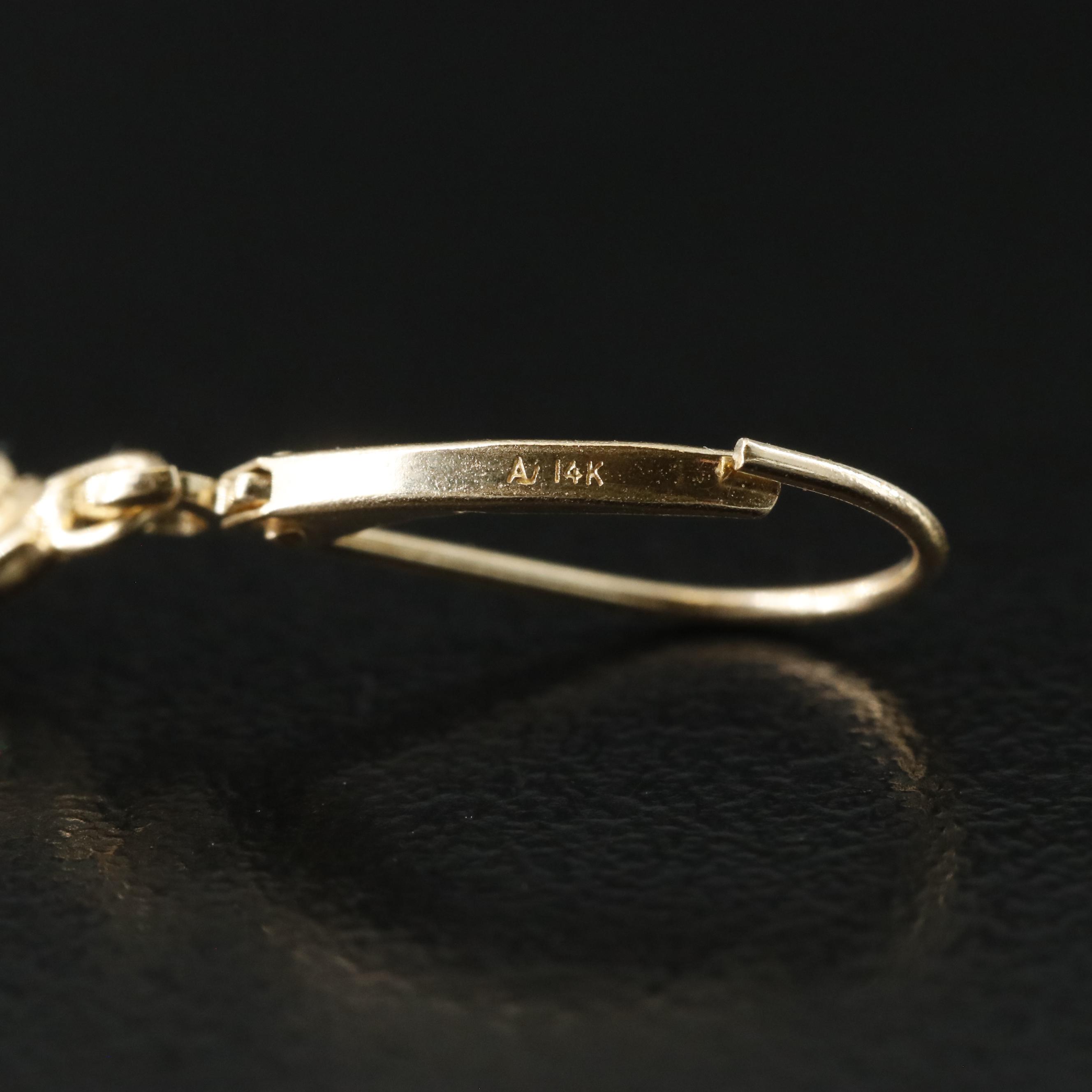 14K Opal and Diamond Accent Twist Earrings