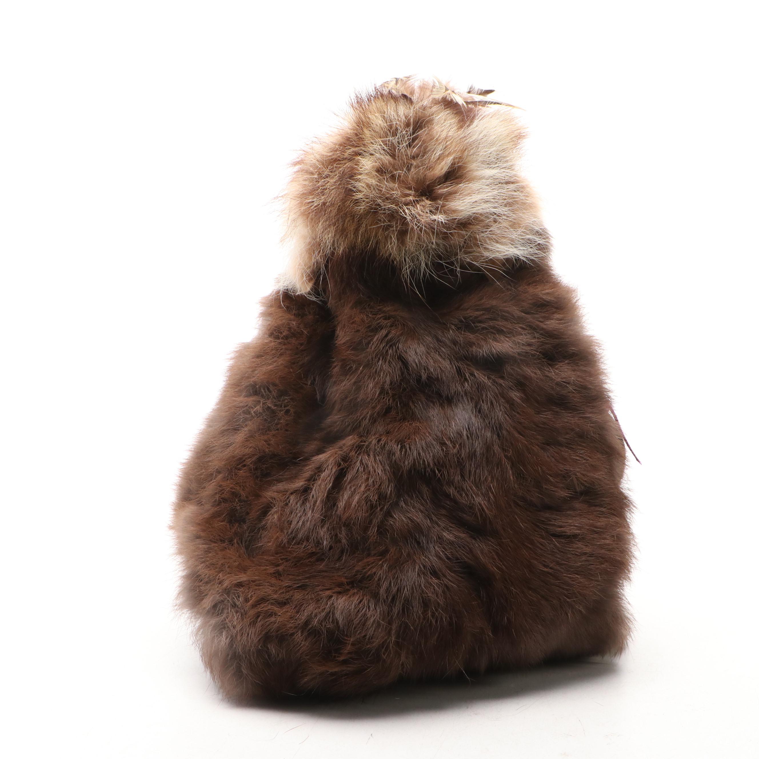 Alaskan Native Porcelain and Natural Fur Dolls