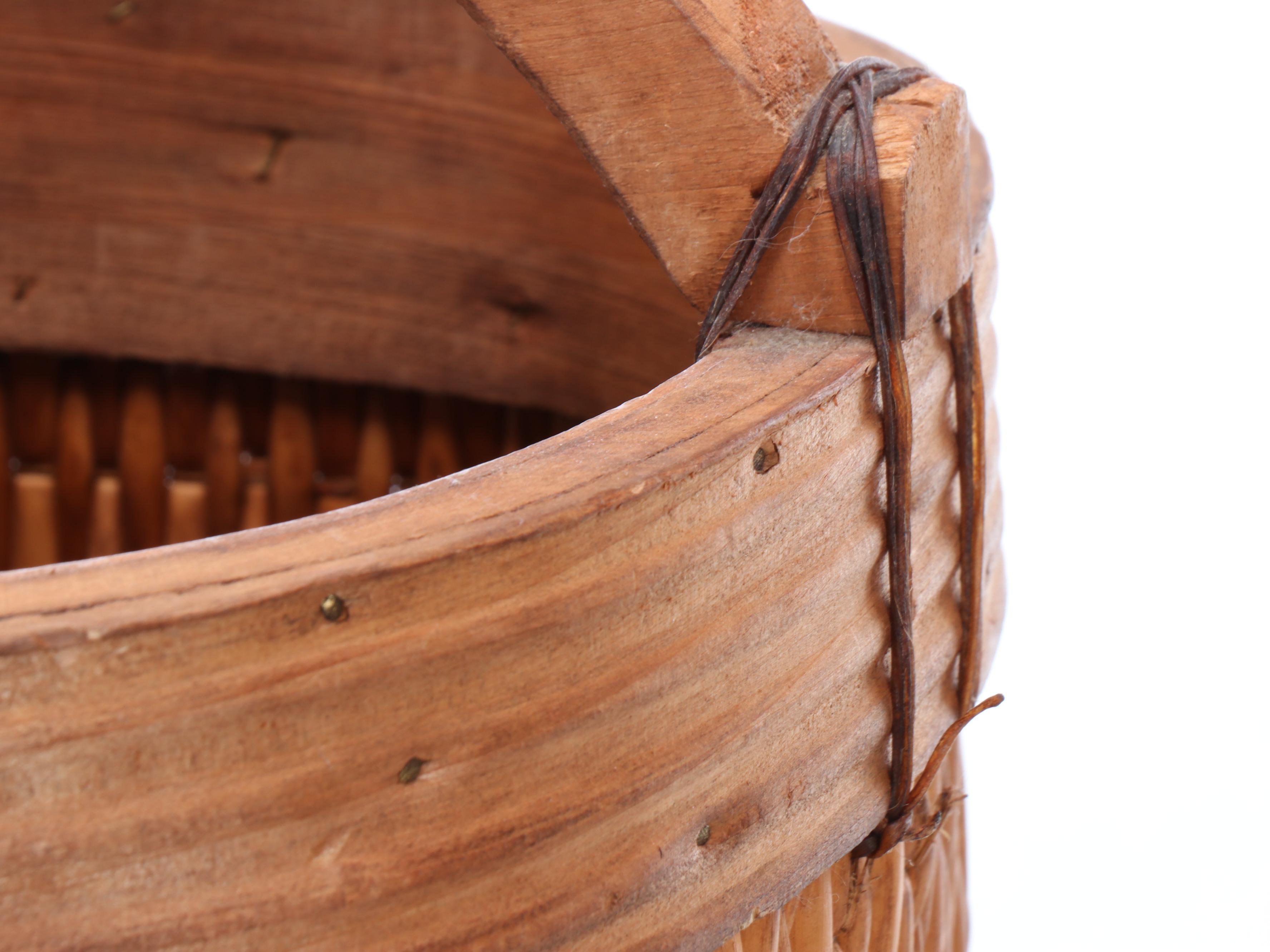 Woven Umbrella Basket with Carved and Painted Wooden Canes