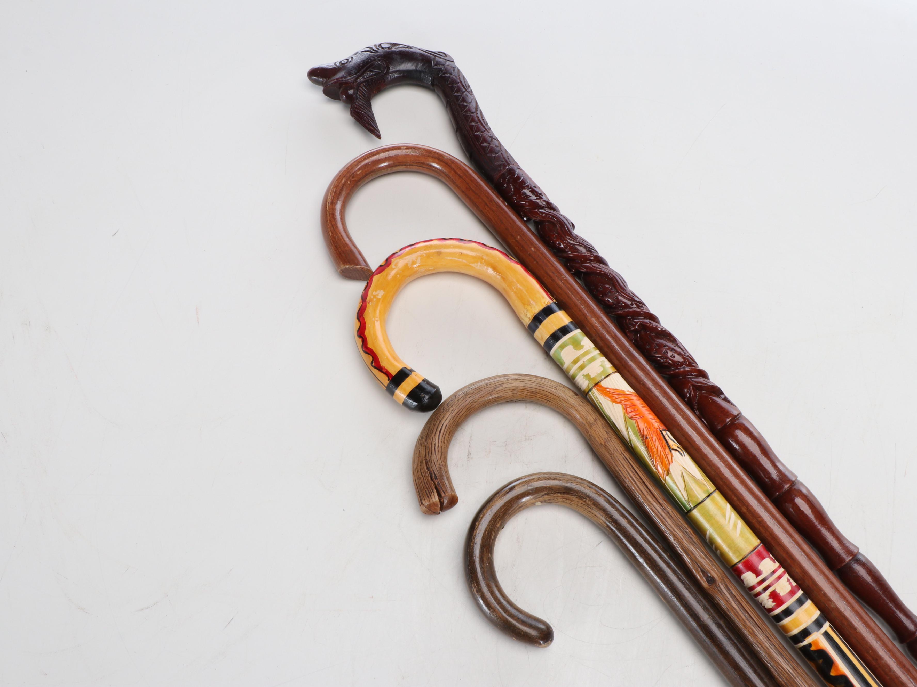 Woven Umbrella Basket with Carved and Painted Wooden Canes